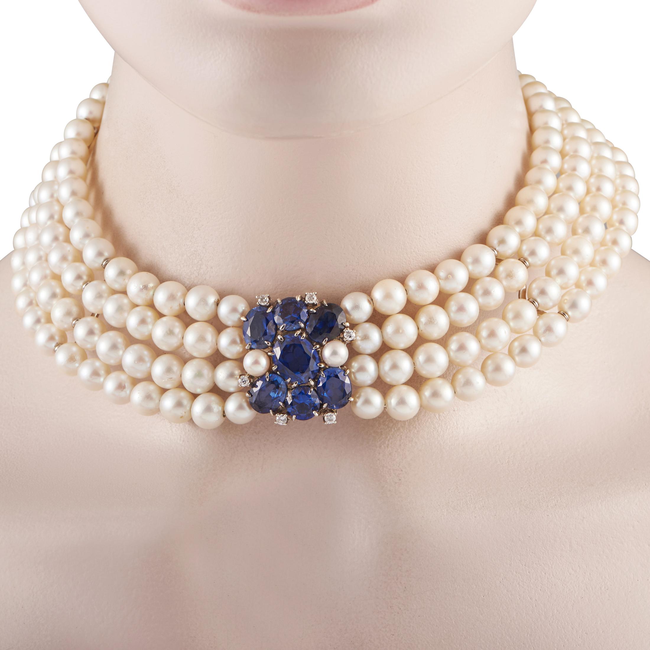 Polish an outfit with royal refinement through this four-row pearl choker from Adler. It features an 18K white gold clasp supporting four strands of white pearls that drape the neck with sophistication. The necklace's focal point is a majestic
