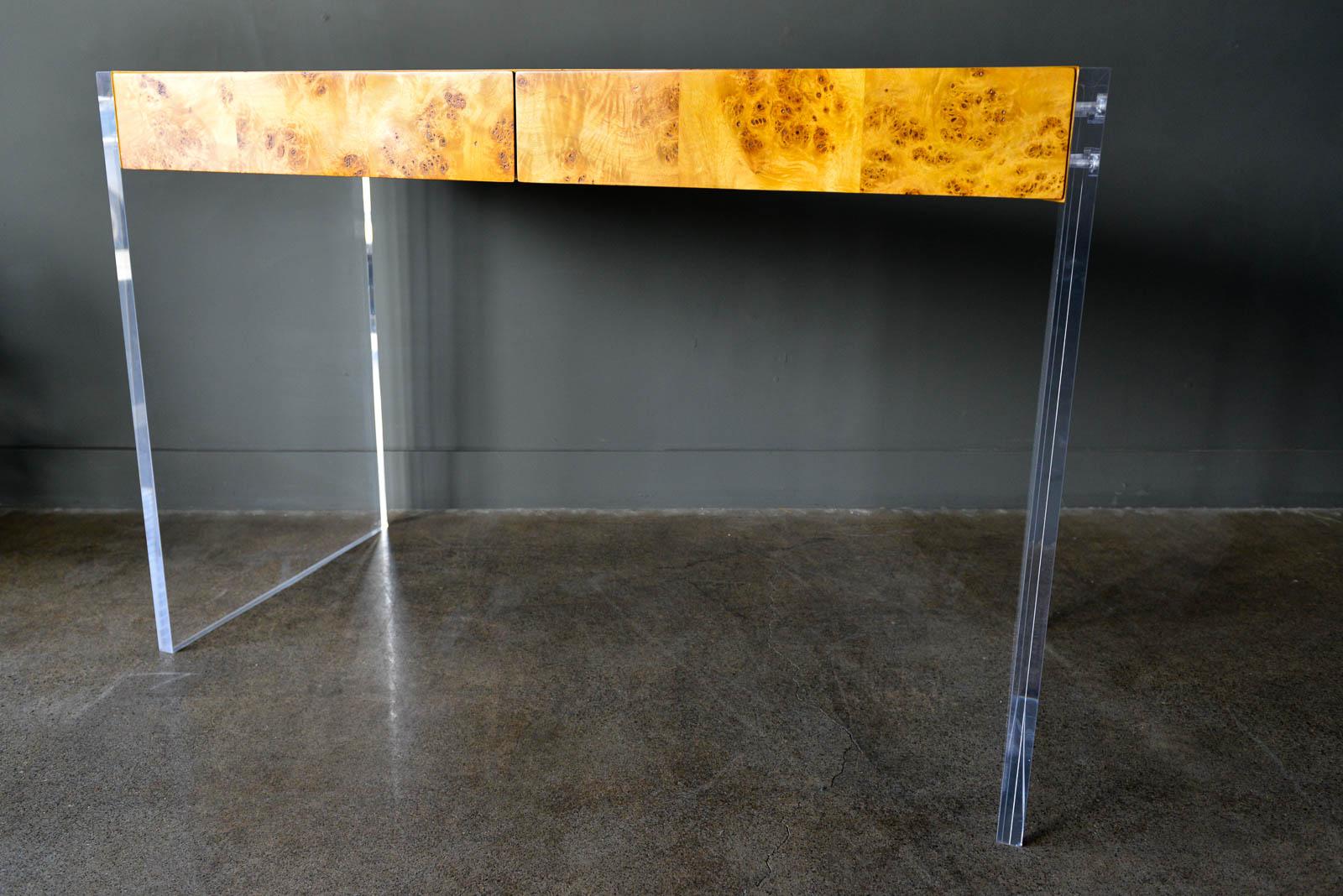 Jonathan Adler Bond burl wood and Lucite desk. Beautiful warm, burl wood and crisp Lucite desk with two soft close sliding flush drawers. Clean lines and classic design. 

We have two of these desks available. Excellent original