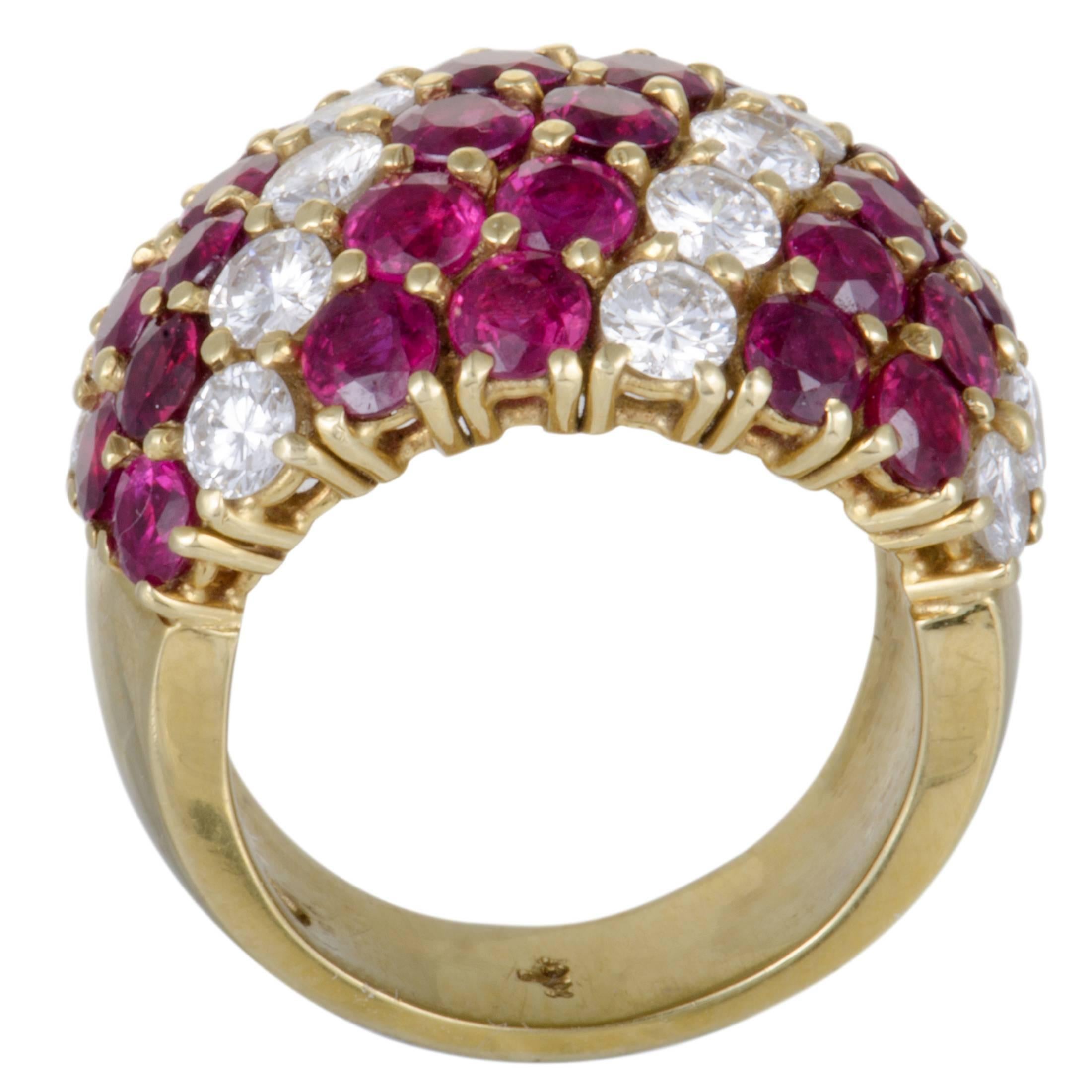 This breathtaking ring is beautifully designed by Adler in shimmering 18K yellow gold. The sensational ring displays an exquisitely charming appeal with its extravagant adornment of dazzling diamonds, weighing 2.90ct and captivating rubies, weighing