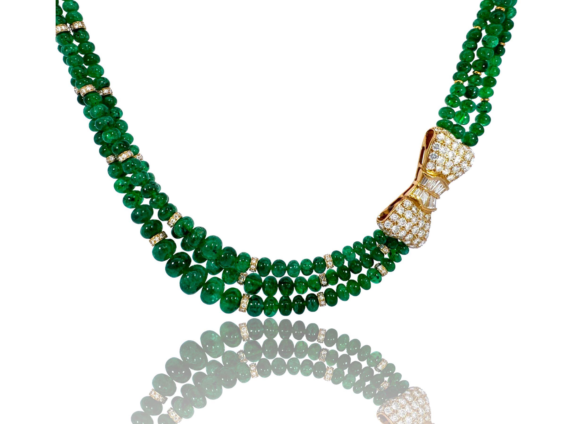 Adler Genève Gorgeous 18 kt. Yellow Gold 190 ct. Emeralds Beaded necklace with an Stunning Bow shaped clasp, Estate from  His Highness the Sultan Of Oman Qaboos Bin Said.
Amazing Emerald & Diamond necklace, one of a kind.

Emerald: Intense green,