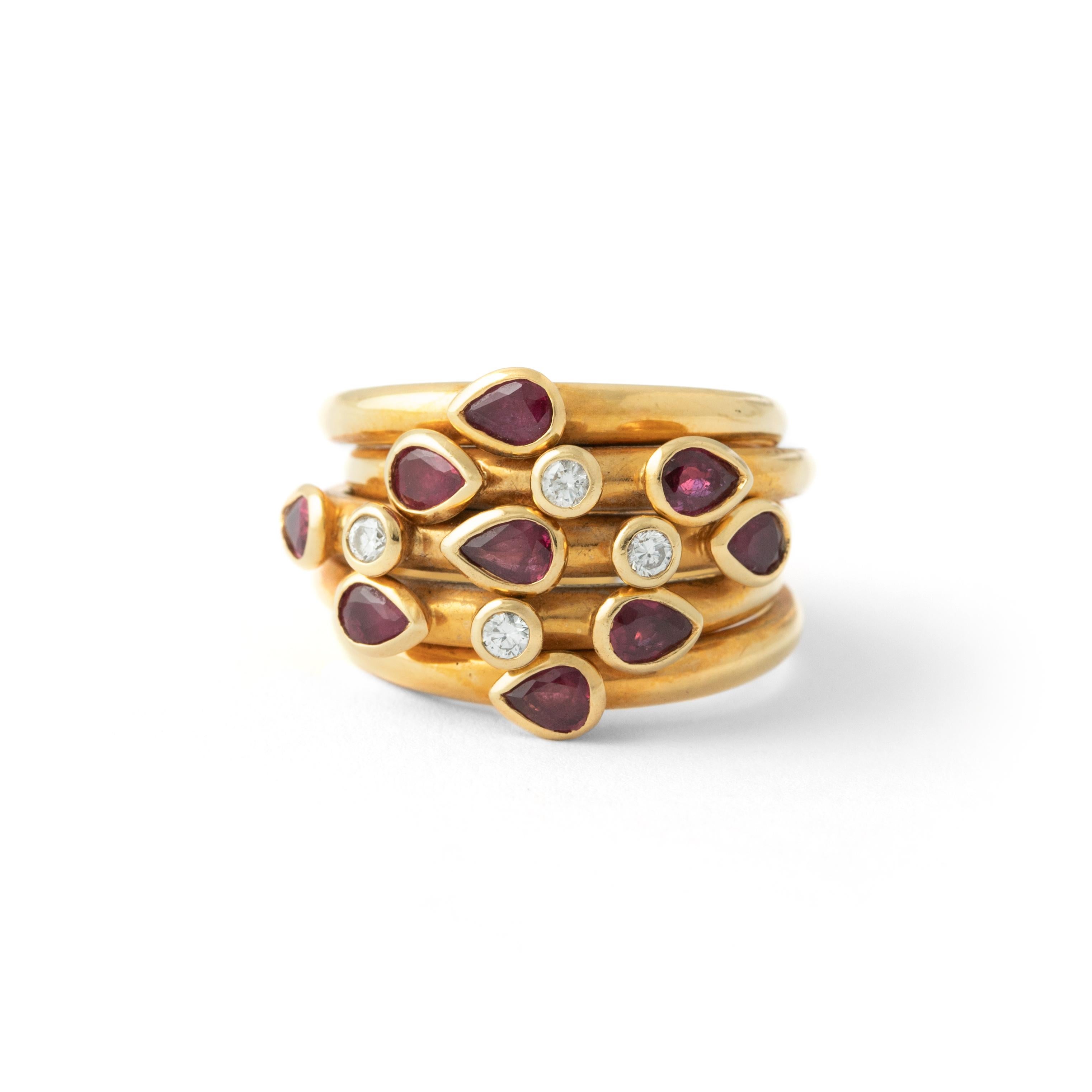 Adler Seragilo Collection Ruby Diamond Yellow Gold 18K Ring.
5 rings gathered altogether.
Signed Adler.
Seragilo Collection.

Total weight: 15.25 grams.

Ring Size: 55 / 5.75 US.