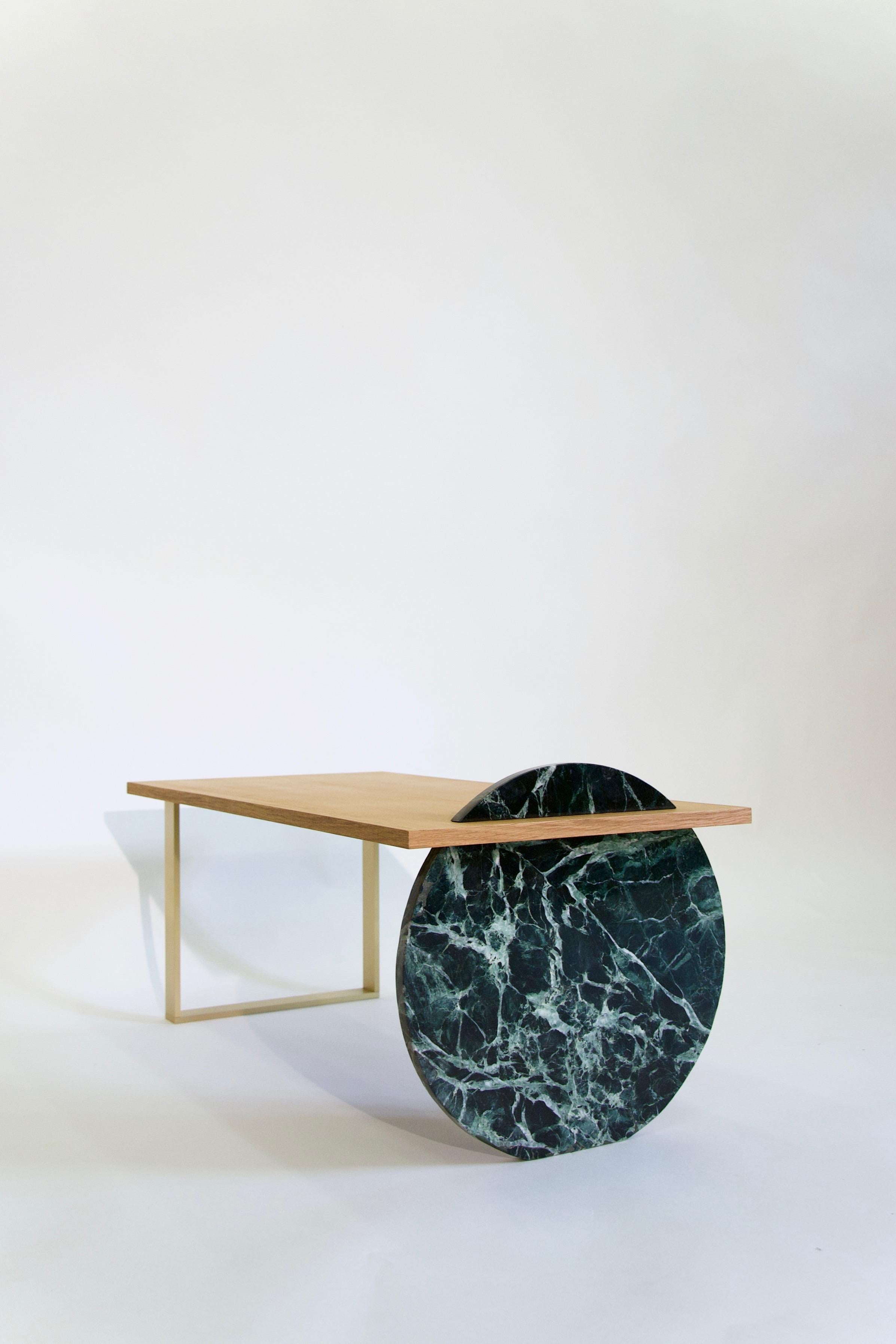 ADN coffee table by Helder Barbosa
Materials: Marble, CP oak and brass
Dimensions: 93 x 46 x 37 cm

Trained as a craftsman (école Boulle, 2014), Helder Barbosa is a designer who lives and works in Paris.

Attracted by minimalist shapes, he