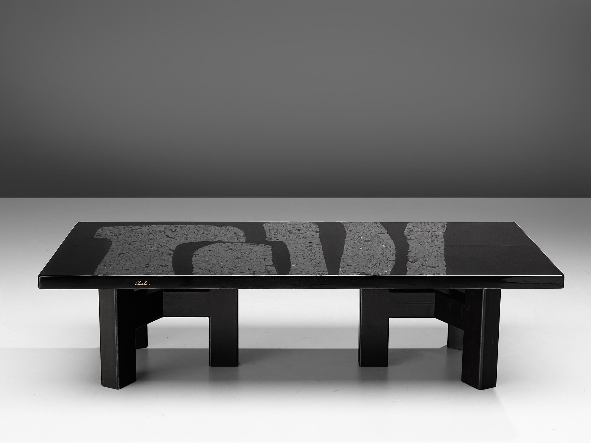 Ado Chale, coffee table, cast resin, hematite, steel, gold-mounted ruby, Belgium, 1970s
A luxurious cocktail table by the Belgian designer Ado Chale. The piece shows a high level of details, the black resin tabletop is inlayed with hematite,