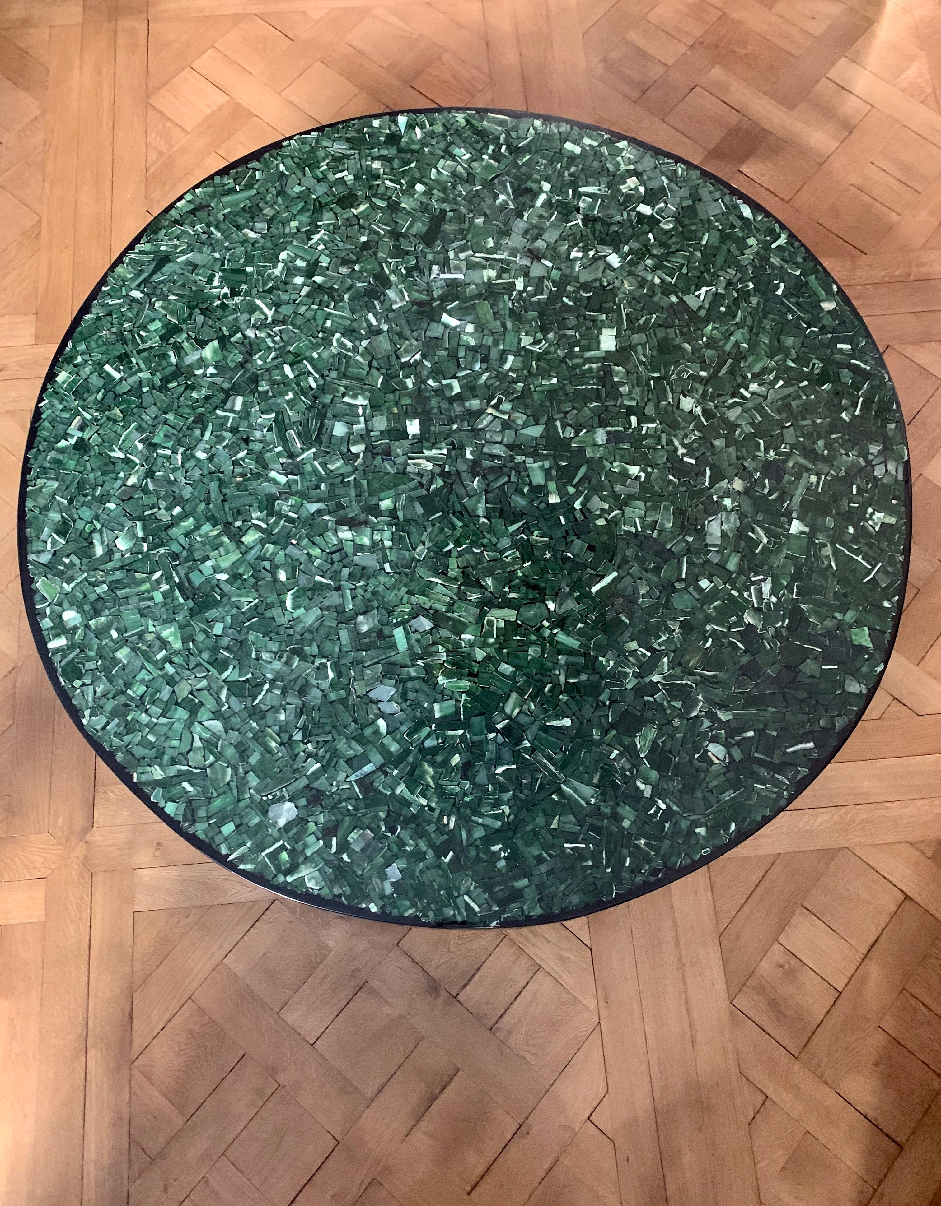 A unique coffee table on base crimped in bronze with mosaic top in nephrite jade by Ado Chale. 
Creation: Chale Collection in 1970.
Chale is is a Belgian artist and designer best known for his exquisite mosaic inlays.
Ado Chale’s tables, sculptures,