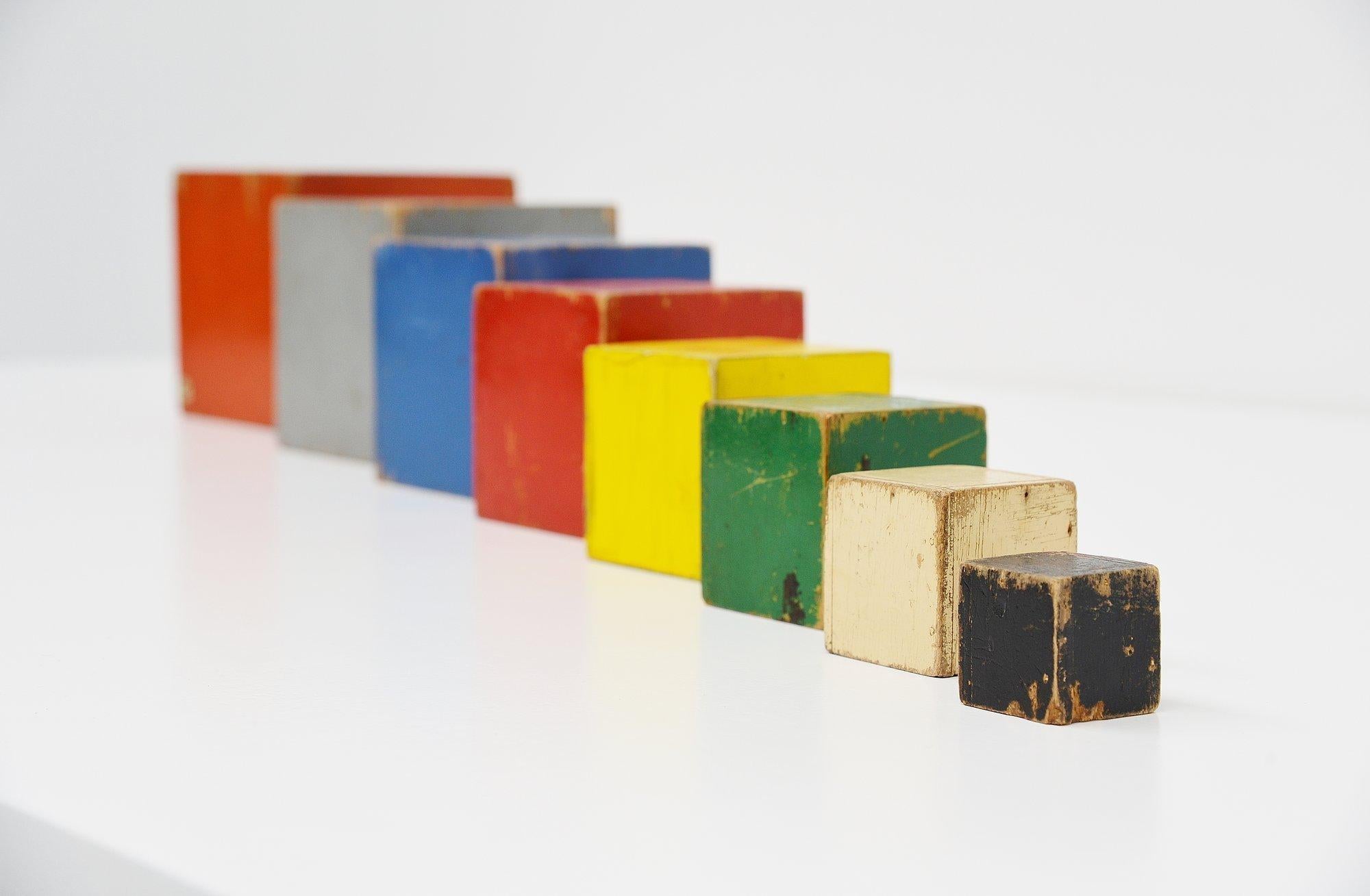 Very nice decorative wooden toy cubes set model 856, designed by Ko Verzuu for Ado Holland in the 1937. Ado means Arbeid door onvolwaardigen, translated; labor by incapacitated, which makes this an even more special piece. Toys by Ado are being