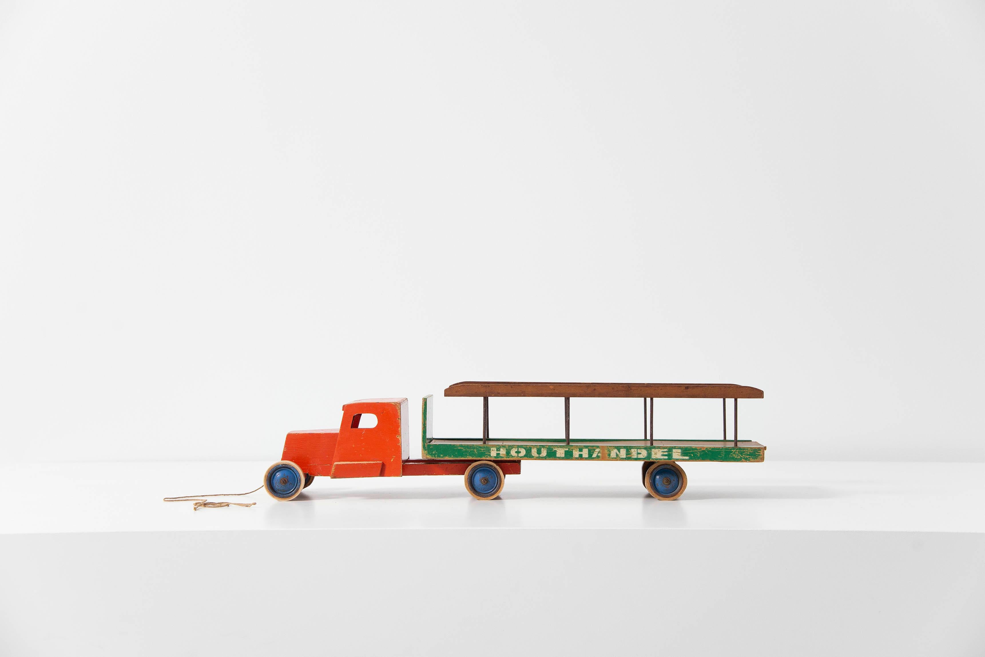 Rare collectible toy ‘houthandel’ (wood transport) truck designed by Ko Verzuu for Ado Holland in 1948. Ado means Arbeid door onvolwaardigen, translated; labor by incapacitated, which makes this an even more special piece. Toys by Ado are being