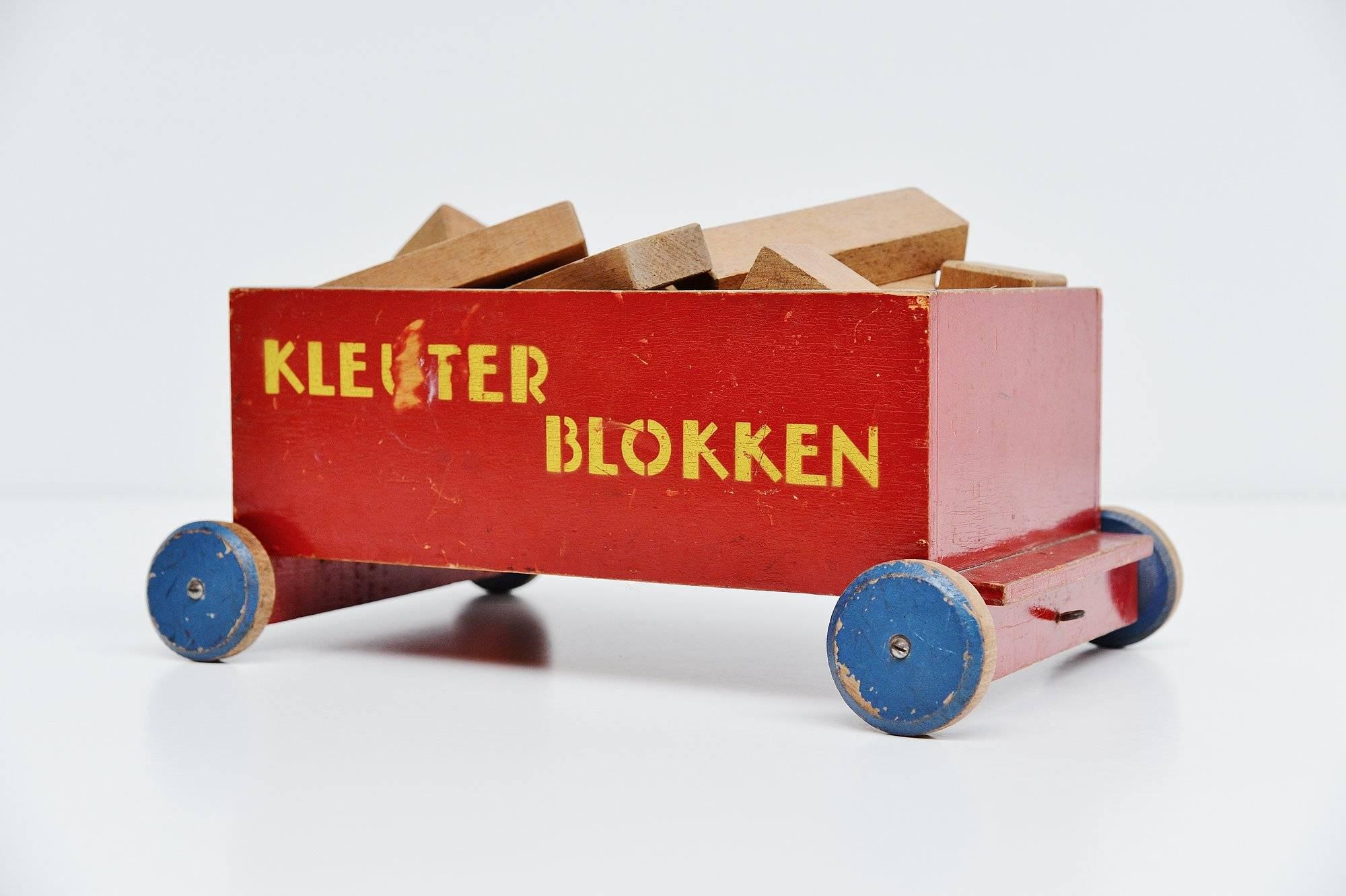 Very nice decorative toy ‘kleuterblokken’ (kids cubes) cart designed by Ko Verzuu for Ado Holland in 1935. Ado means Arbeid door onvolwaardigen, translated; labor by incapacitated, which makes this an even more special piece. Toys by Ado are being