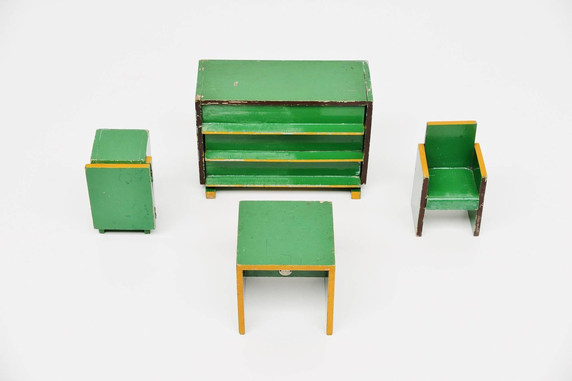 Very nice set of small toy furniture designed by Ko Verzuu for Ado Holland in 1939. Ado means Arbeid door onvolwaardigen, translated; labor by incapacitated, which makes this an even more special piece. Toys by Ado are being highly collected at the