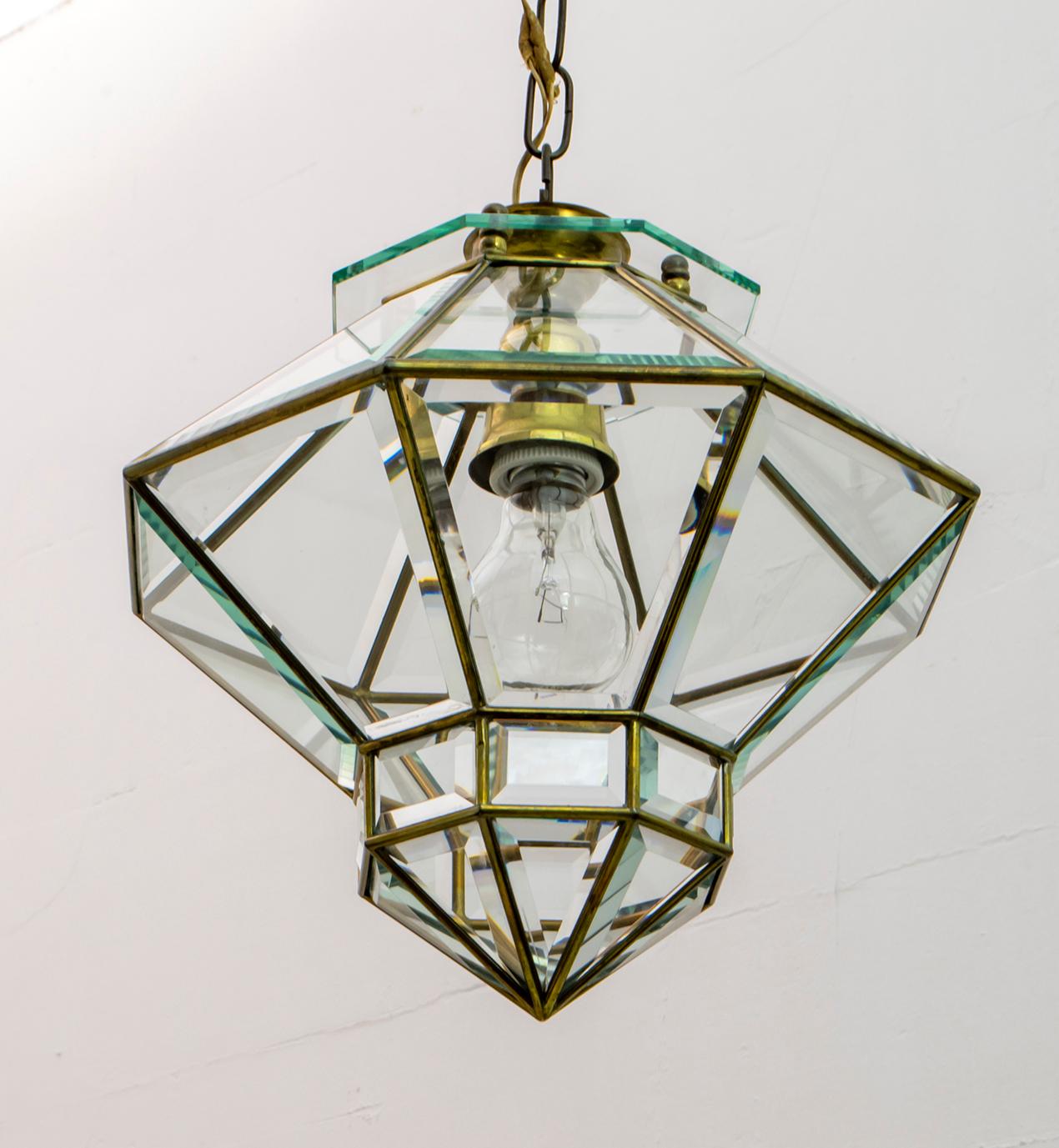 Secessionist Vienna (Sezession, Secessionsstil or Jugendstil) period and style pendant and beveled glass suspension fixture attributed to the Austro-Czech architect and designer Adolf Loos (1870-1933) of octagonal shape with 32 beveled glass panels