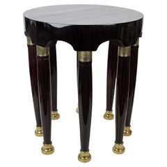 Adolf Loos´s  round Table,  with eight columned Legs and Brass Fittings 