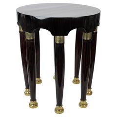 Adolf Loos´s round Table, with eight columned Legs and Brass Fittings