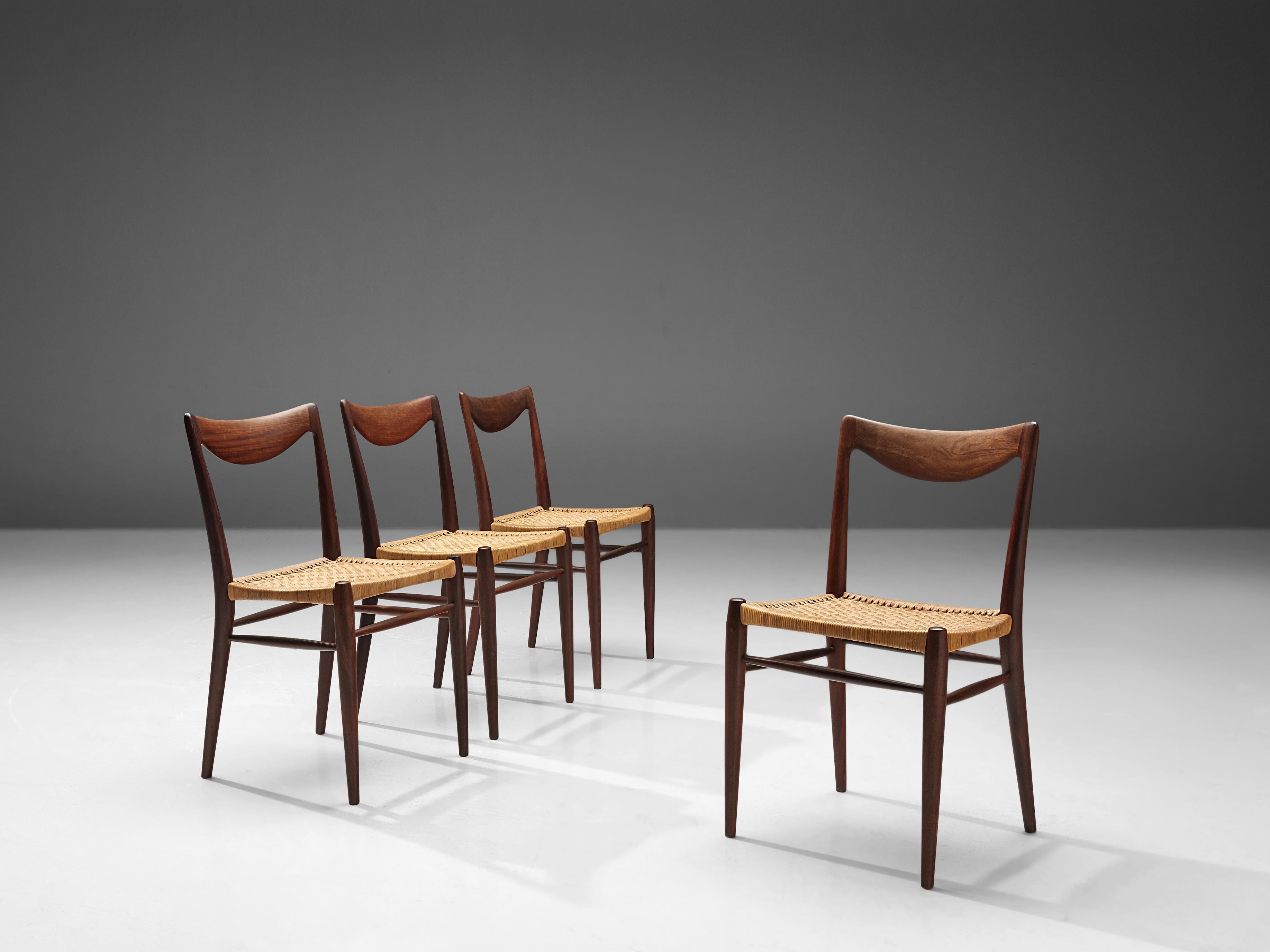 Adolf Relling and Rolf Rastad by Relling Tegnekontor for Gustav Bahus , set of four dining chairs, model 'Bambi', teak and cane, Norway, 1950s. 

Elegant set of four dining chairs, model 'Bambi', designed by Adolf Relling and Rolf Rastad. These
