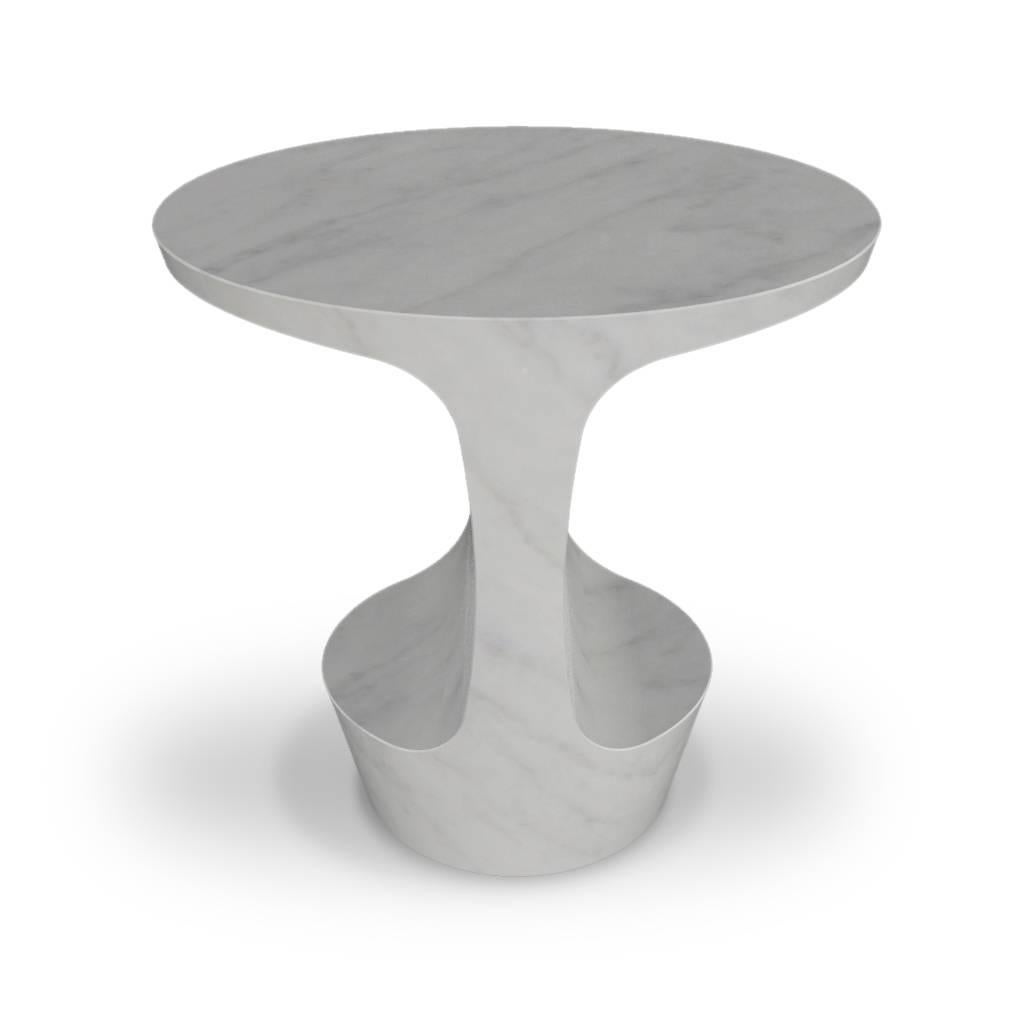 Side table designed by Adolfo Abejon.
Manufactured in Barcelona (Spain).

Material:
Carrara marble. 
It can be also done on Marquina marble as shown on the photos.

Finish:
Artisan polished.

Colours:
Carrara white.
It can be also done