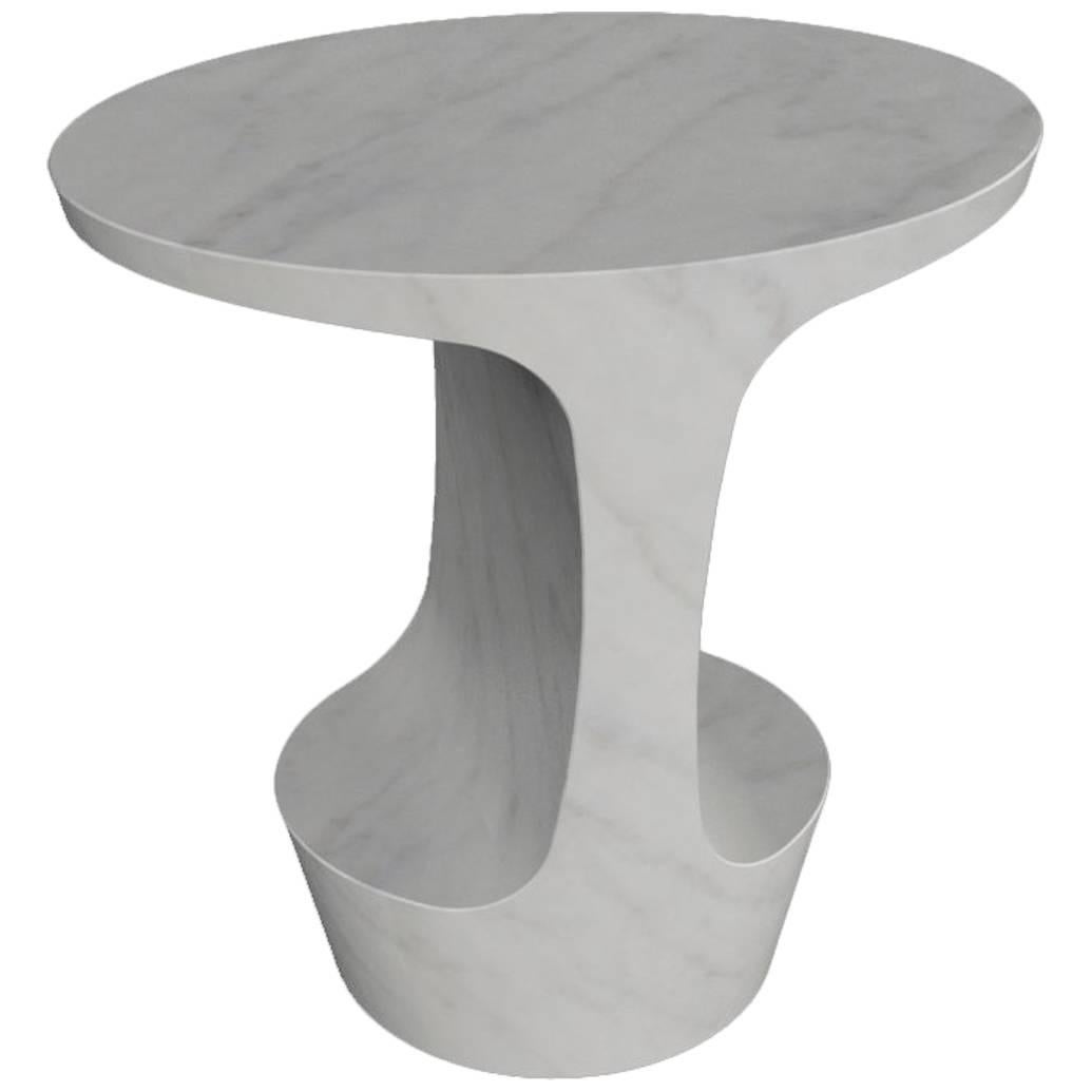Side table designed by Adolfo Abejon.
Manufactured in Barcelona (Spain).

Material:
Carrara marble. 
It can be also done on Marquina marble as shown on the photos.

Finish:
Artisan polished.

Colors:
Carrara white
It can be also done on
