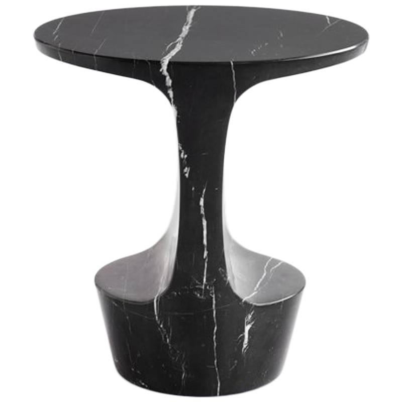Side table designed by Adolfo Abejon.

Material:
Marquina marble or Carrara marble.

Finish:
Artisan polished.

Colors:
Marquina black or Carrara white.

Dimensions:
42 × 32 × 43 cm (L × W × H).

The Marble of the piece will be