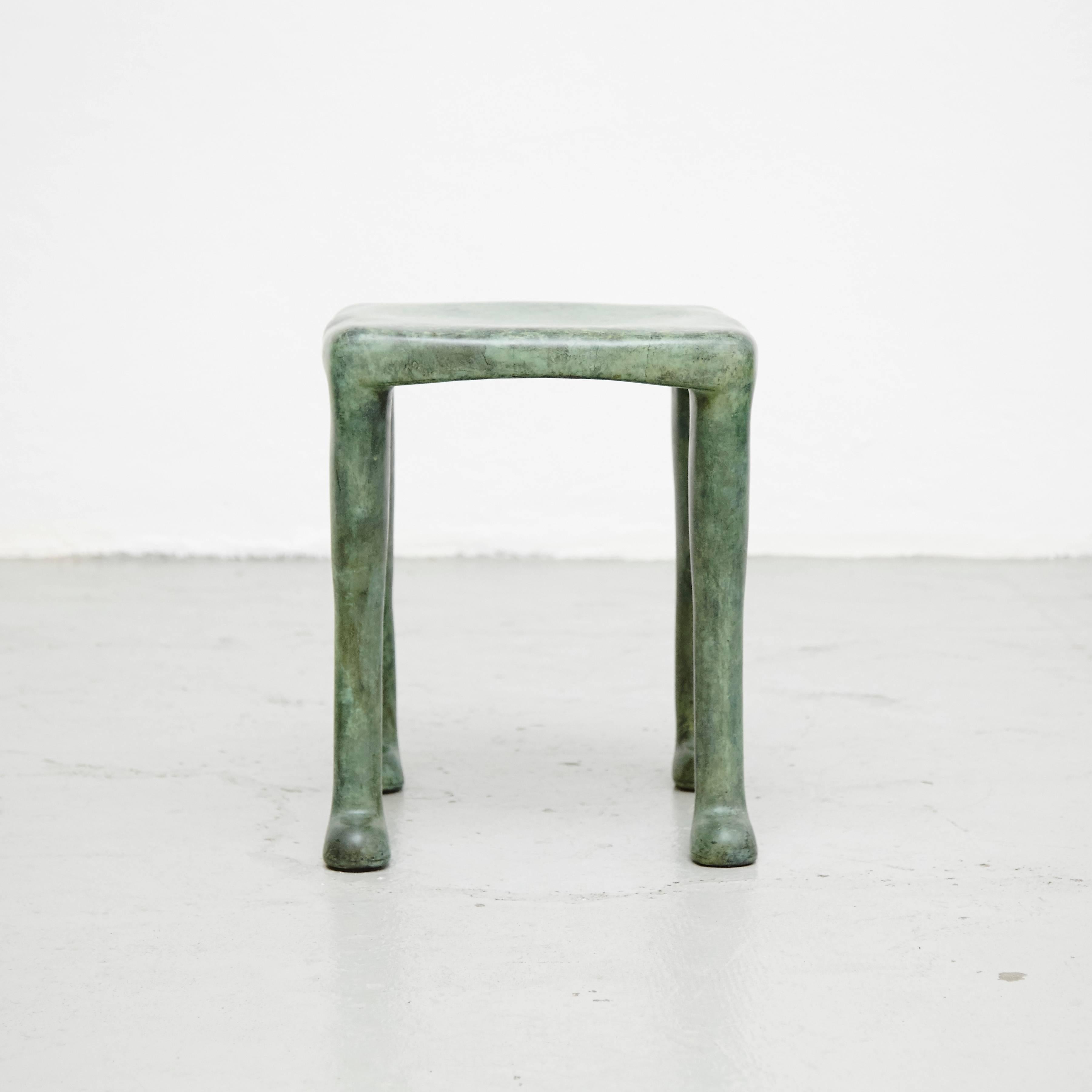 Khamon is a cast bronze stool built as an sculpture. The inspiration for Khamon comes from the willingness to dignify the stool as a piece of furniture often forgotten. It combines a polished finish with a green patina.

This is a unique artist