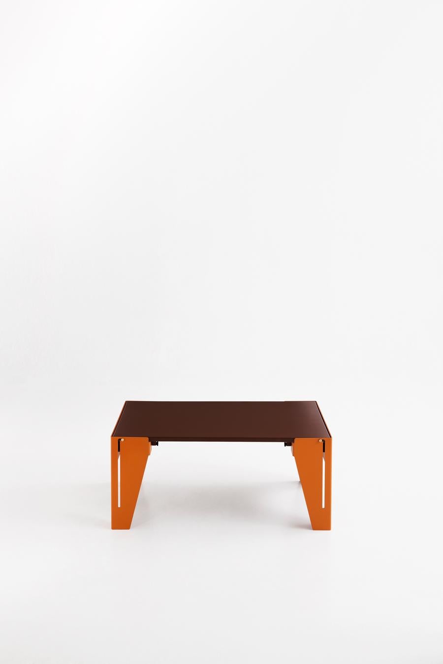 Falcon is a coffee table made out of lacquered wood, painted aluminium sheet and brass. It’s based on the ideas of transformation and efficiency; its goal is to offer a functional design. Falcon changes like Nature itself and has two positions: the