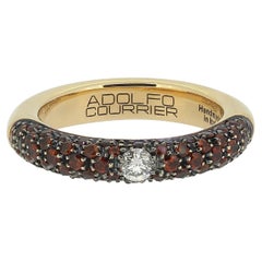 Anillo de zafiro naranja y diamantes Adolfo Courrier