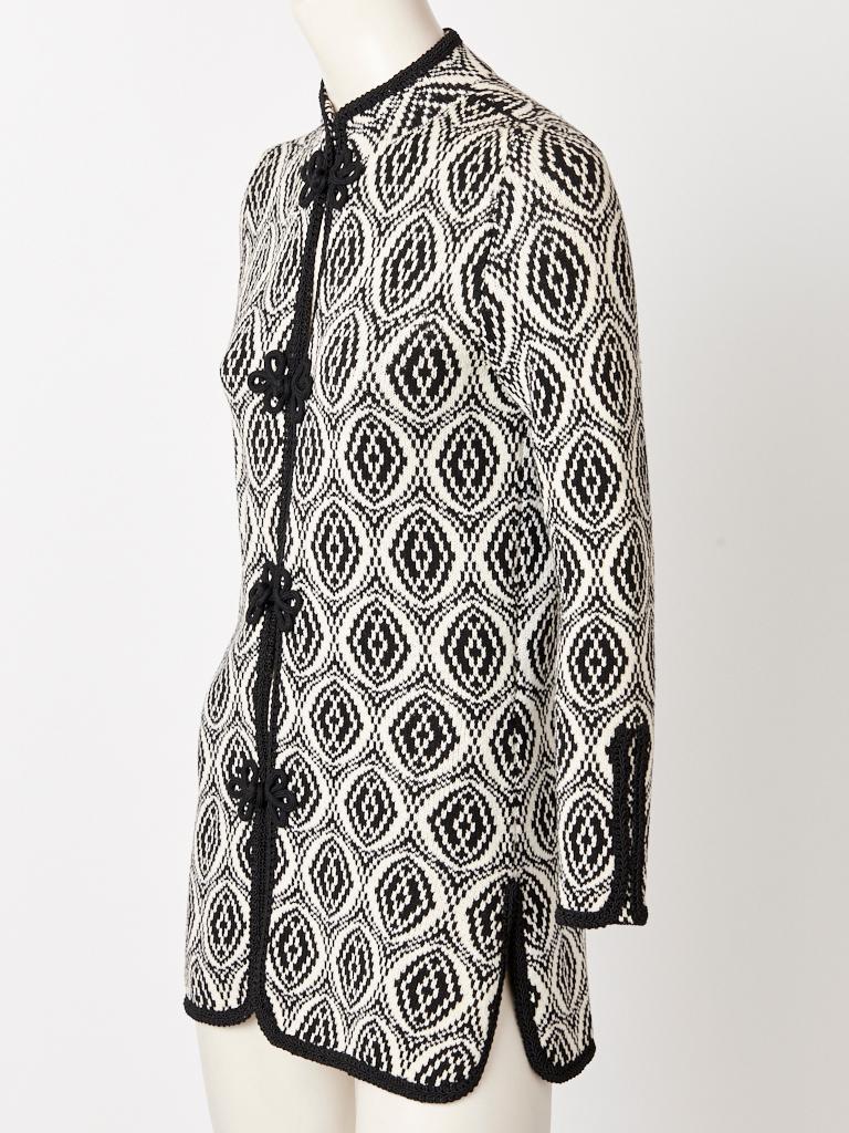 Adolfo, black and white, graphic pattern, knit, Chinese inspired, cardigan, having a mandarin collar, passementerie, trim detail along the edges and 