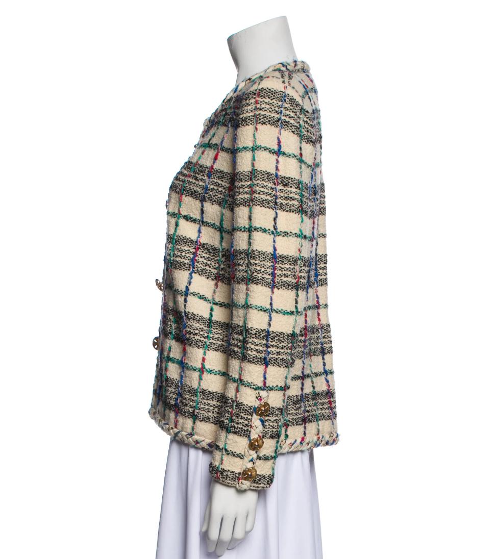 Adolfo Vintage Evening Plaid Knitted Jacket, 1980s

Vintage knit jacket by Adolfo in neutral hues. Plaid print. Collarless. Patch pockets, gold tone button closure.

Additional information:
Composition: 100% Wool
Period: 1980’s
Size: