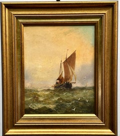 Bateau de pêche anglais du 19e siècle en mer avec lever ou coucher de soleil