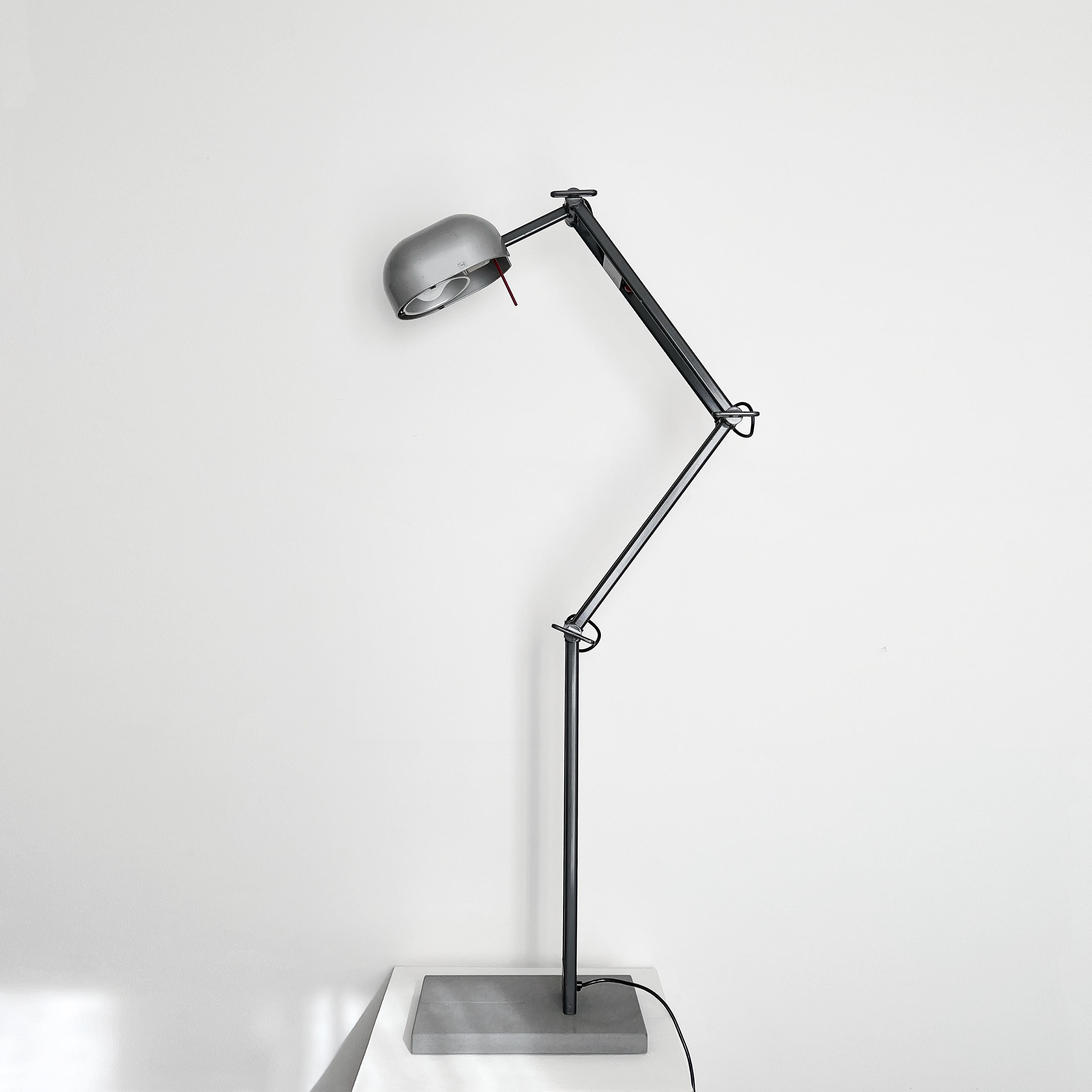 Italian-made Vintage Artemide Adone Floor Lamp from the 1980s with a Modern metal design and stone base.