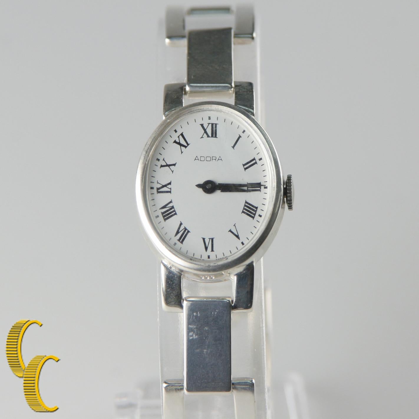 Fabriqué en argent fin .835.
Poids : 32,9 grammes.
La boîte d'origine et les documents ne sont pas inclus.
Cette montre est garantie authentique. Garantie d'un an incluse dans l'achat.

Boîtier ovale en argent fin.
Dimensions : 26 x 21 mm : 26 x 21