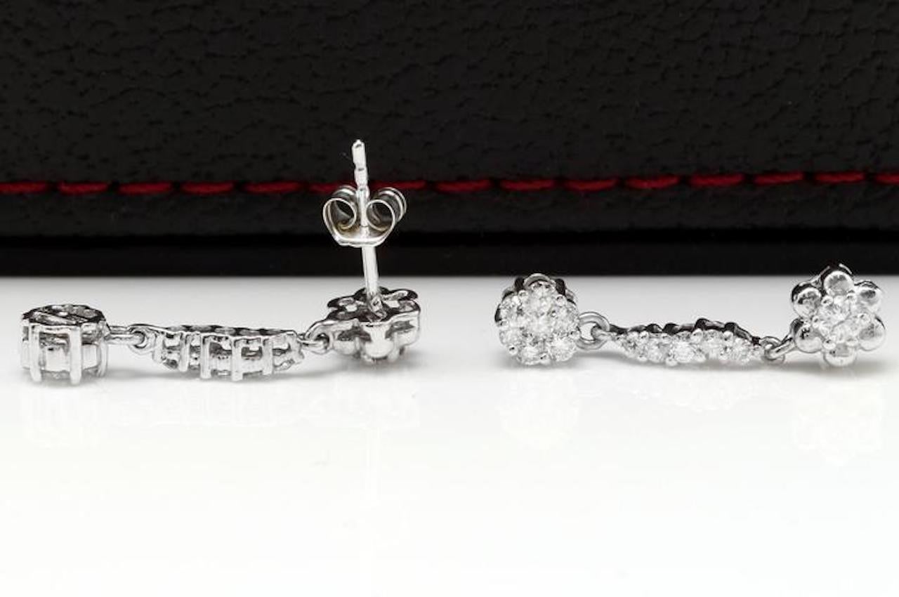 Adorable 1.25 Carats Natural VS Diamond 14K Solid White Gold Earrings

Amazing looking piece!

Total Natural Round Cut Diamonds Weight: 1.25 Carats (Clarity: SI1-SI2 / Color: G-H)

The length of the earring is: 24.70mm

Total Earrings Weight is: 2.8