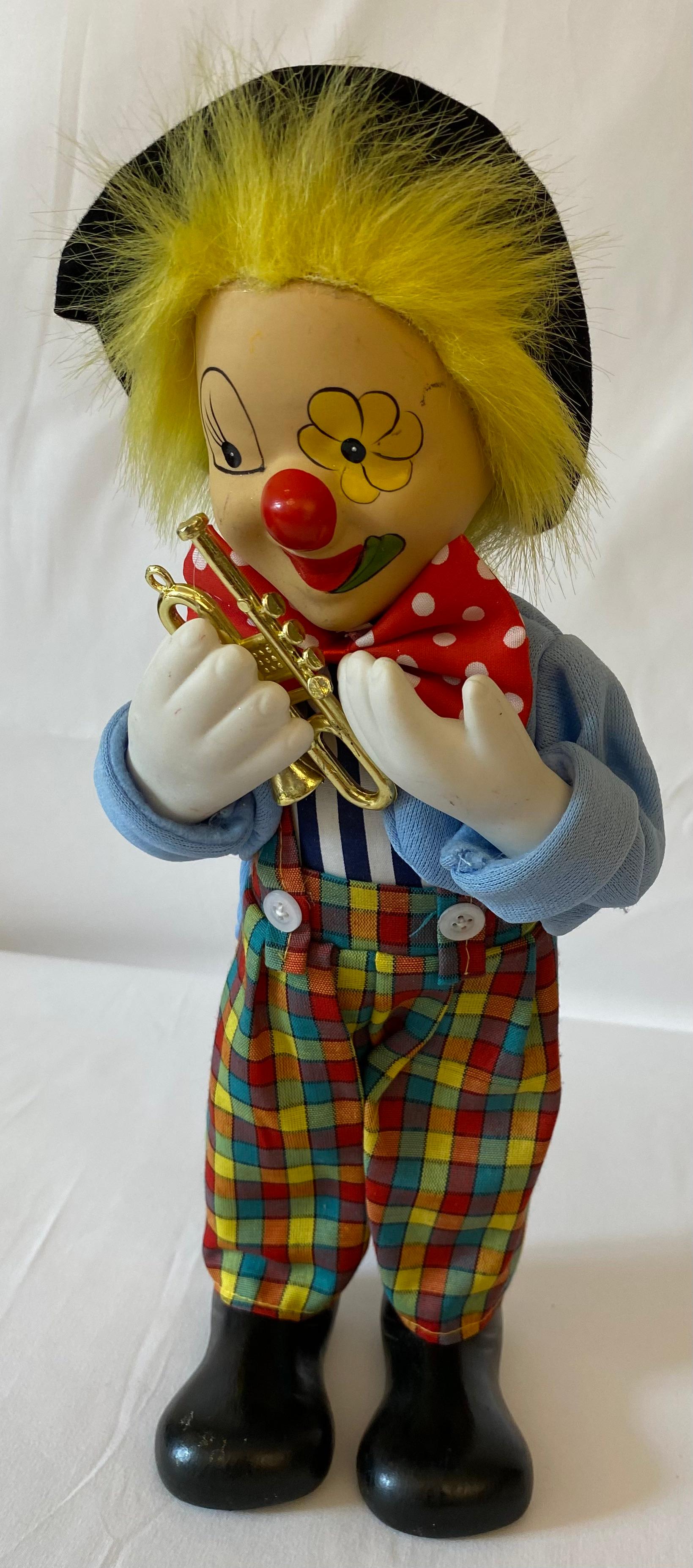 wind up musical clown doll