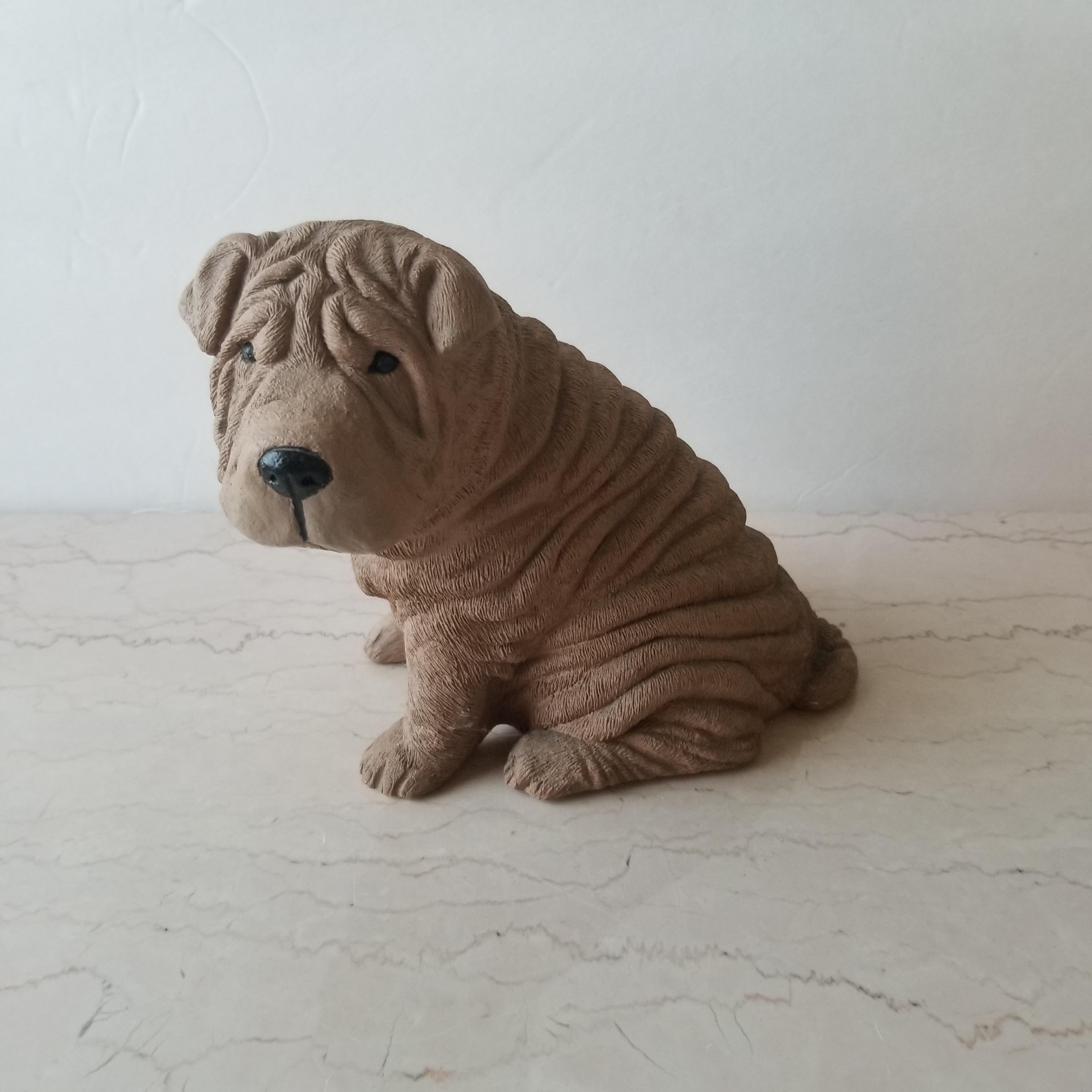 Too cute Shar Pei Dog Table Sculpture. 
Hand cast in clay like material hand painted.
Vintage piece 1986. 
Signed by artist Sandra Brue for Sandicast San Diego CA. 
9d x 6w x 6.5t inches
Original preowned unrestored vintage presentation and