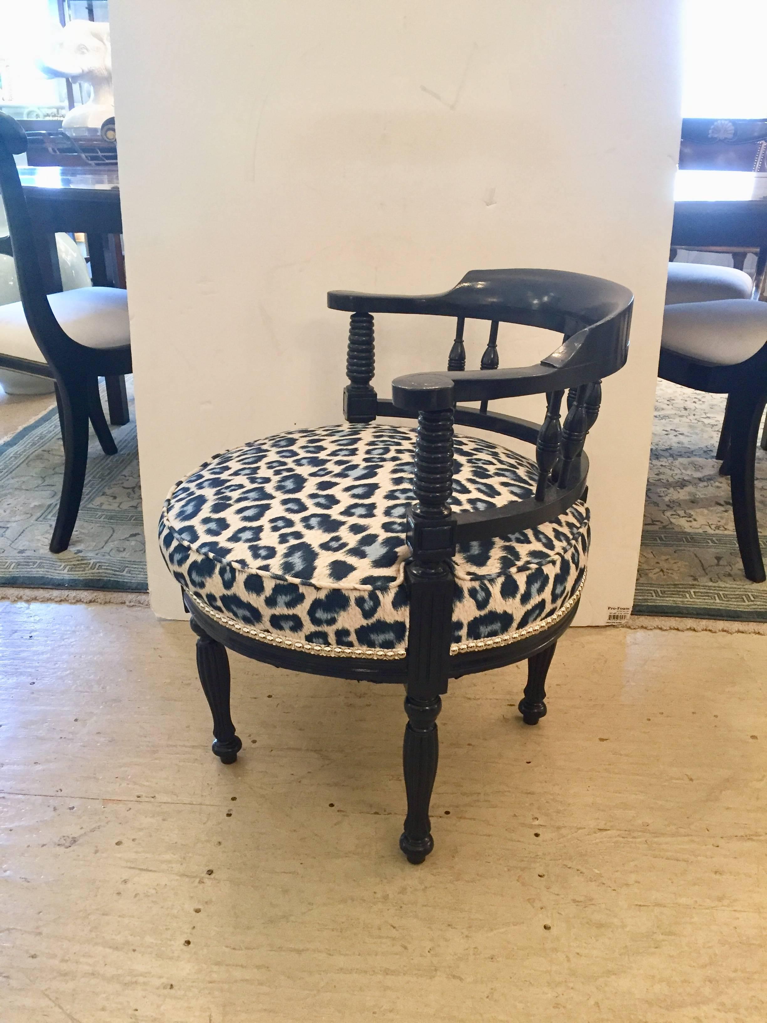 Antique English corner chair stylishly updated with blue laquer, newly upholstered in faux leopard print fabric with nail heads.

Measurements: Seat height 16
Seat depth 21.5.
 