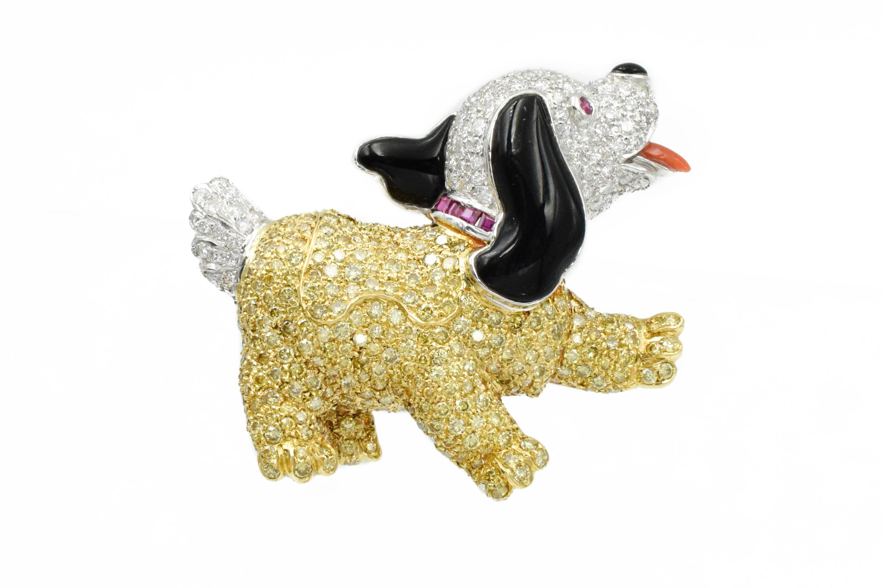 The cutest Cocker Spaniel ever with natural fancy yellow diamond fur!!!
With ruby color eyes and onyx ears.
Estimated total diamond weight is 7.5 carats set in platinum.
Measurements: 2inches x 1.5 inches