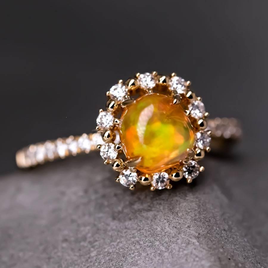 Adorable Orange Mexican Fire Opal & Halo Diamond Engagement Wedding Ring 18K Yellow Gold.


Free Domestic USPS First Class Shipping! Free Gift Bag or Box with every order!

Opal—the queen of gemstones, is one of the most beautiful gemstones in the