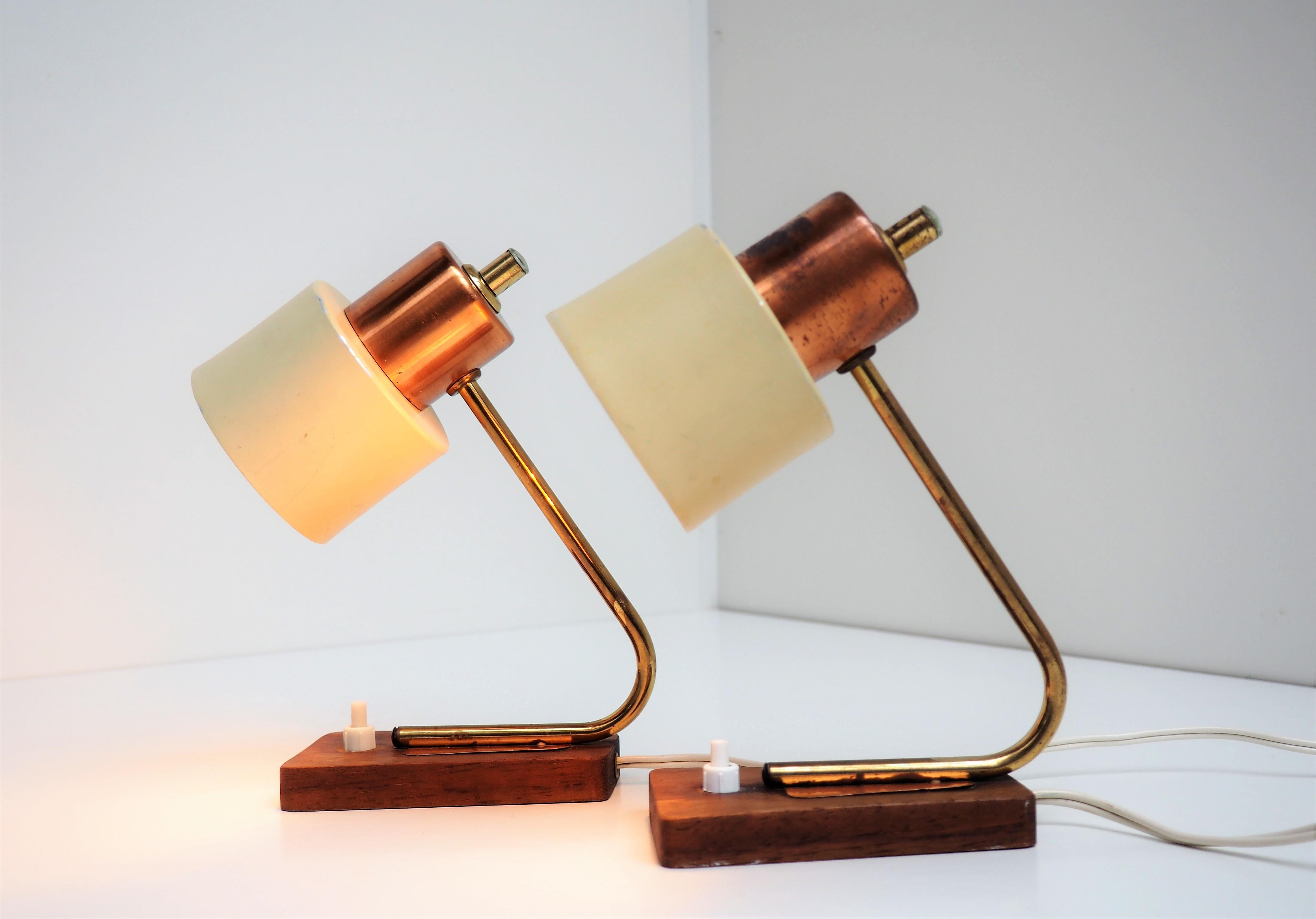 Set of Stilnovo table lamp with base made in teak together with copper, brass and beige painted aluminium shades. Rare set of vintage lighting from the 1950s most likely made by a Danish manufacturer.

The condition is good with some signs from