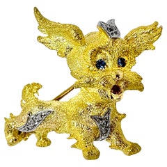 Adorable Puppy Brooch in 18K Yellow Gold with Sapphire Eyes & Ruby Tongue