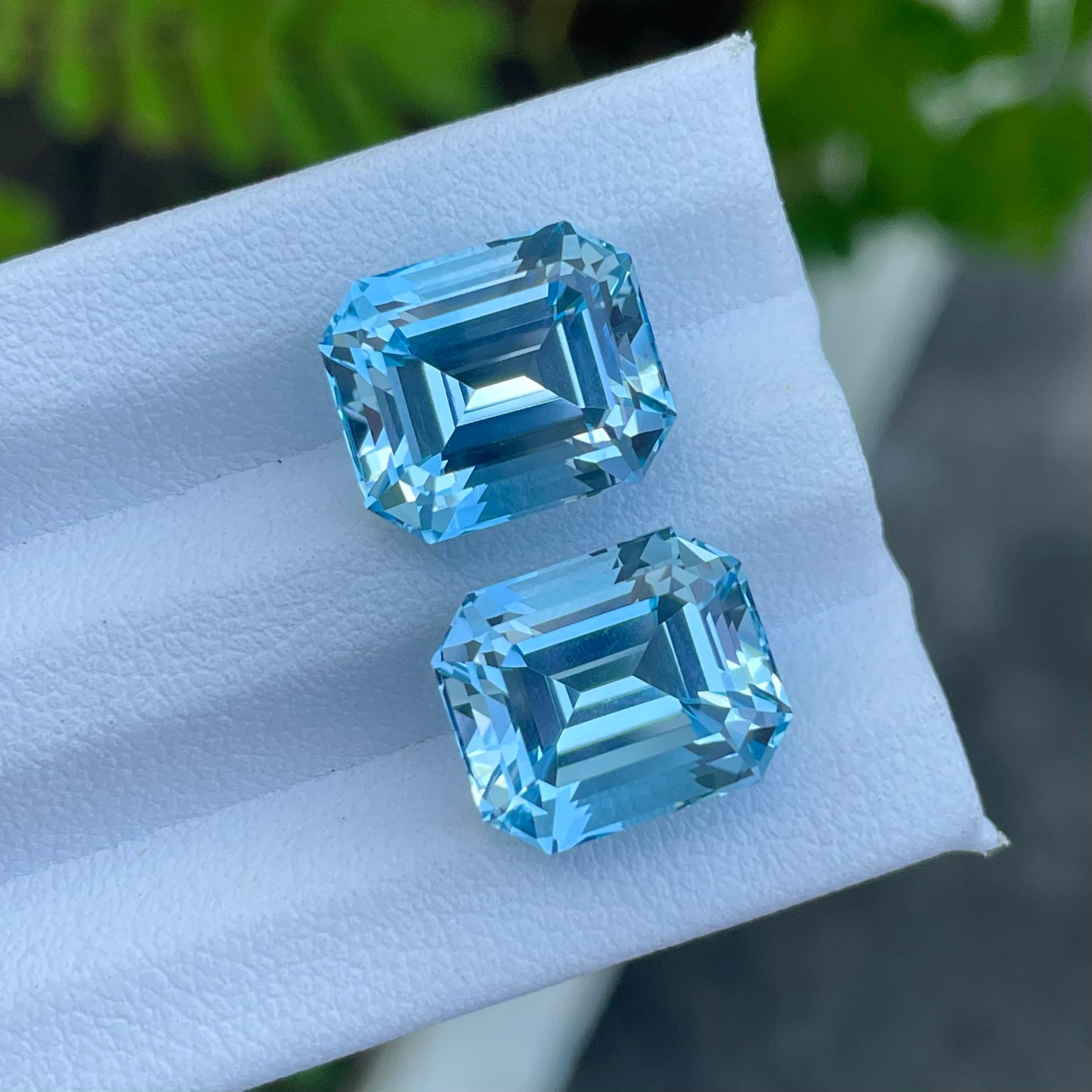 Weight 20.65 carats 
Dimensions 12.4 x 10.3 x 9.1 mm
Treatment Heated 
Origin Madagascar
Clarity Loupe Clean 
Shape Octagon 
Cut Emerald 



Experience the stunning allure of this Swiss Blue Topaz pair, boasting a combined weight of 20.65 carats.