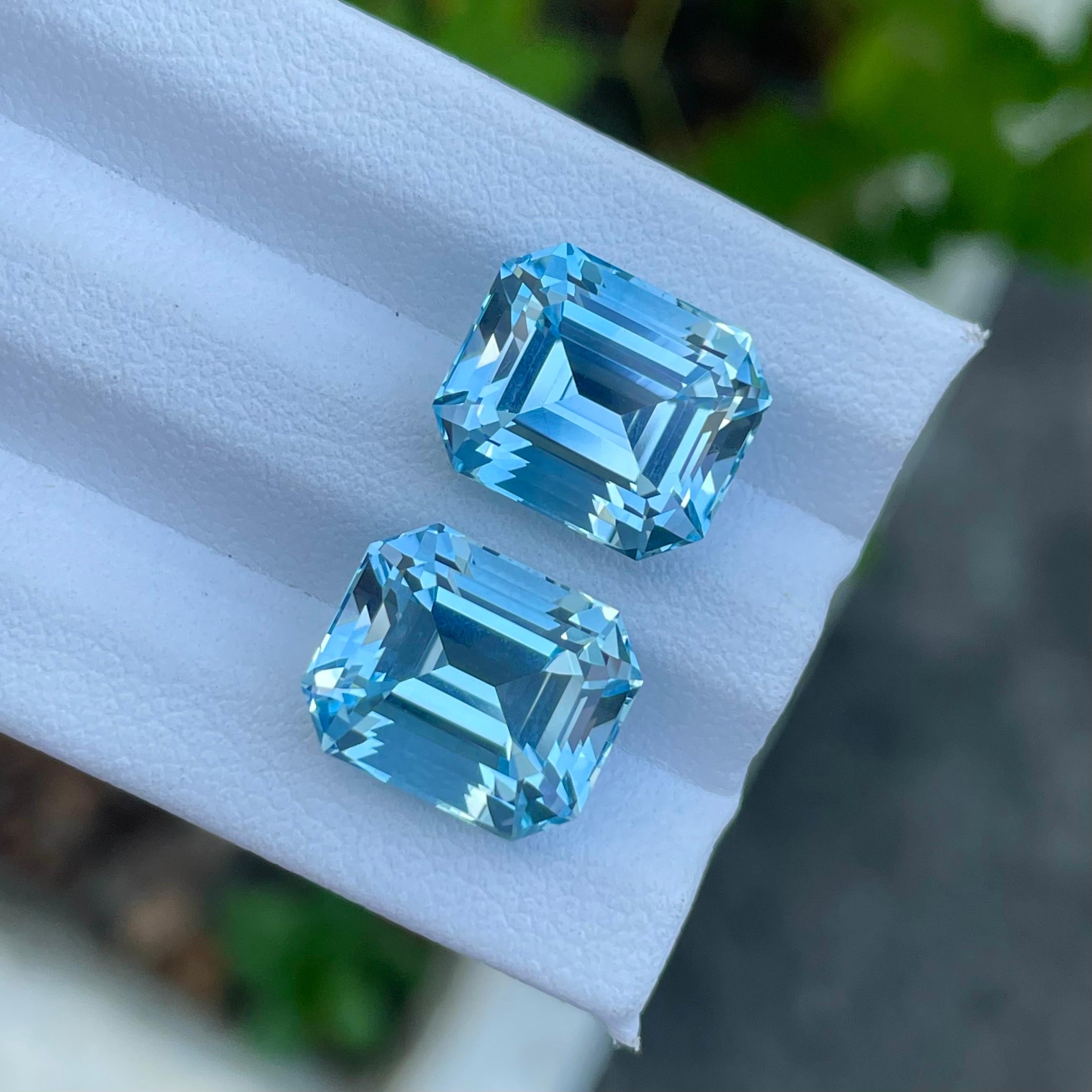 Adorable Swiss Blue Topaz Pair 20.65 carats Emerald Cut Natural Madagascar's Gem In New Condition For Sale In Bangkok, TH