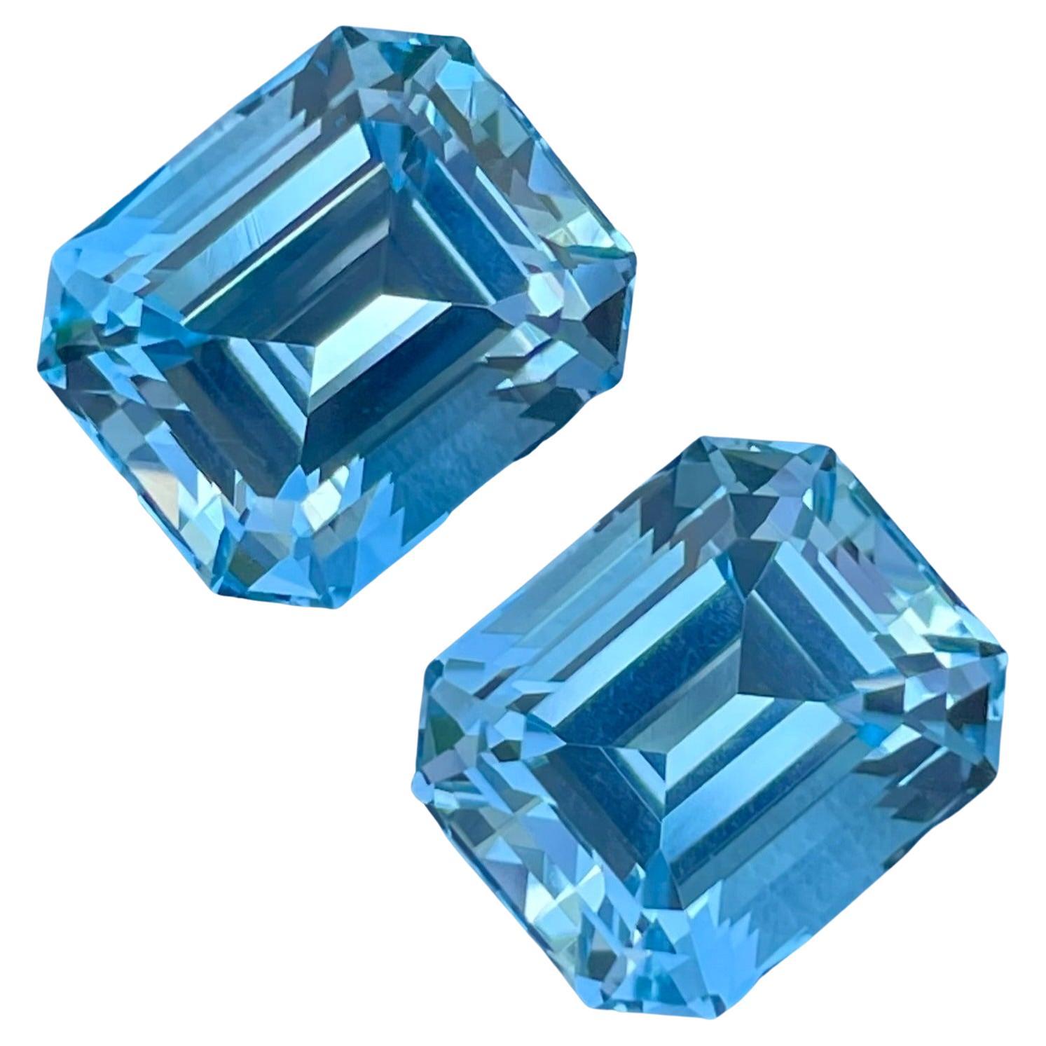 Adorable Swiss Blue Topaz Pair 20.65 carats Emerald Cut Natural Madagascar's Gem For Sale