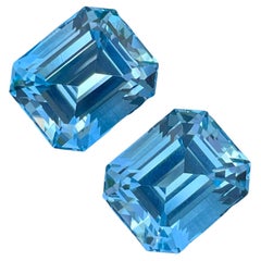 Adorable Swiss Blue Topaz Pair 20.65 carats Emerald Cut Natural Madagascar's Gem