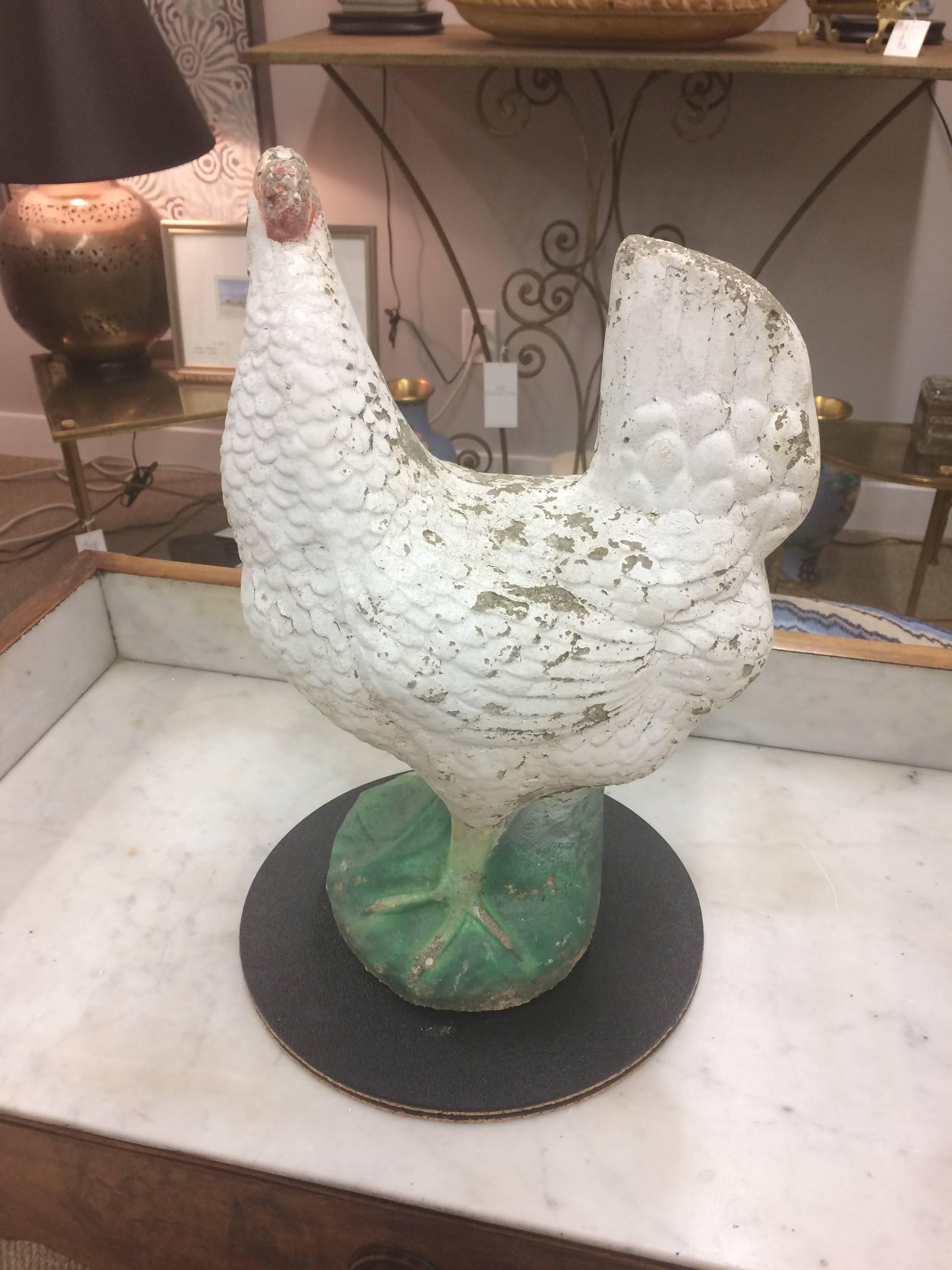 A wonderful garden cement sculpture of a country chicken, hand-painted and naturally distressed due to age.