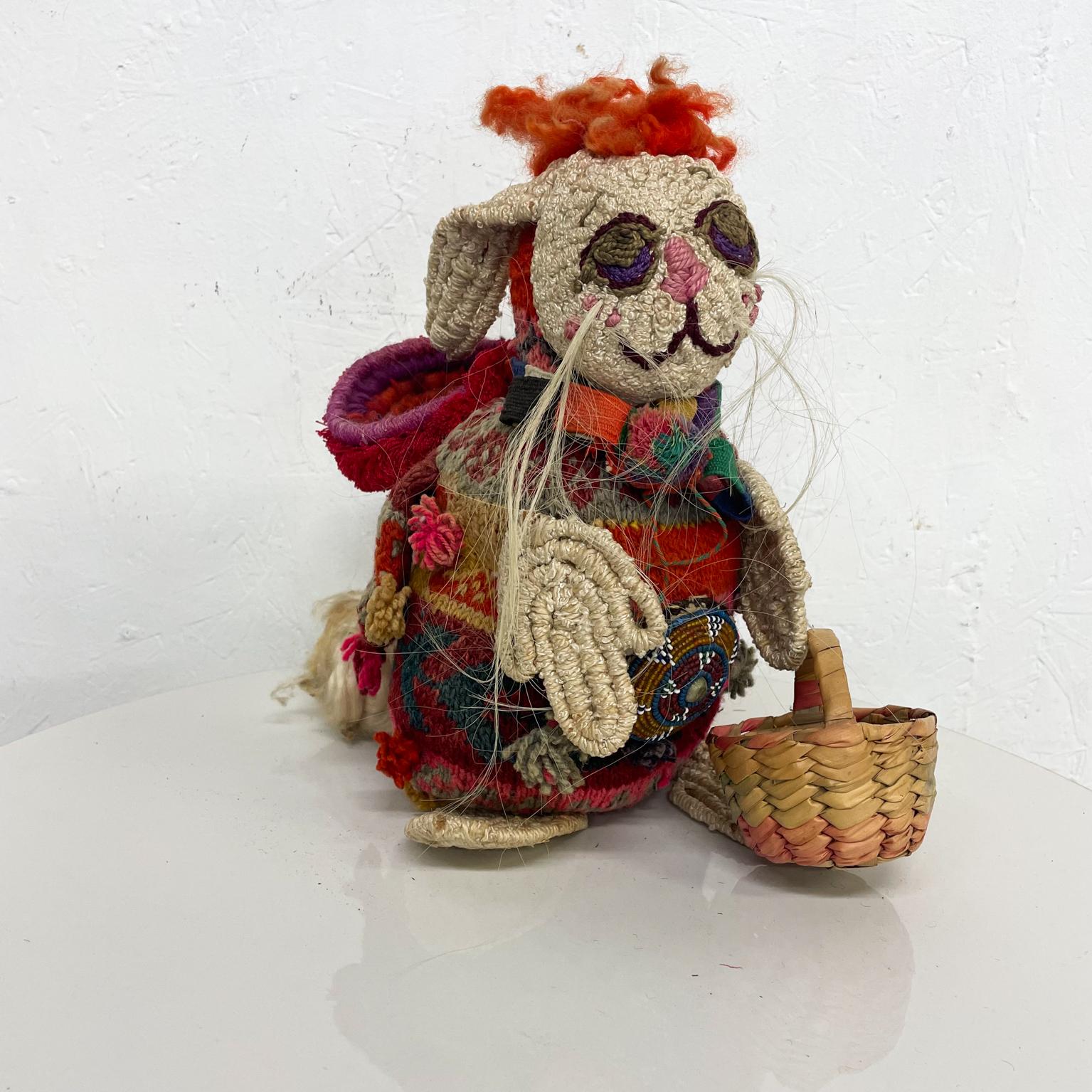 Adorable Vintage Peruvian folk art pink bunny rabbit with basket handmade wool.
Measures: 12 H X 6.25 W X 11.5 D
Unmarked.
Preowned unrestored original vintage condition.
See images provided.