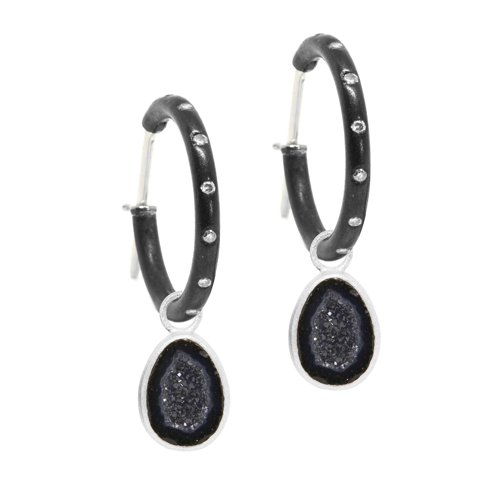 Organic and asymmetrical, and detailed with black geodes for a bold, mysterious edge, the Adorn Petite Silver Charms pair with any of our hoops and mix well with other styles.

Metal: Sterling Silver Oxidized
Stone carat: 4.7
Diamond carat: