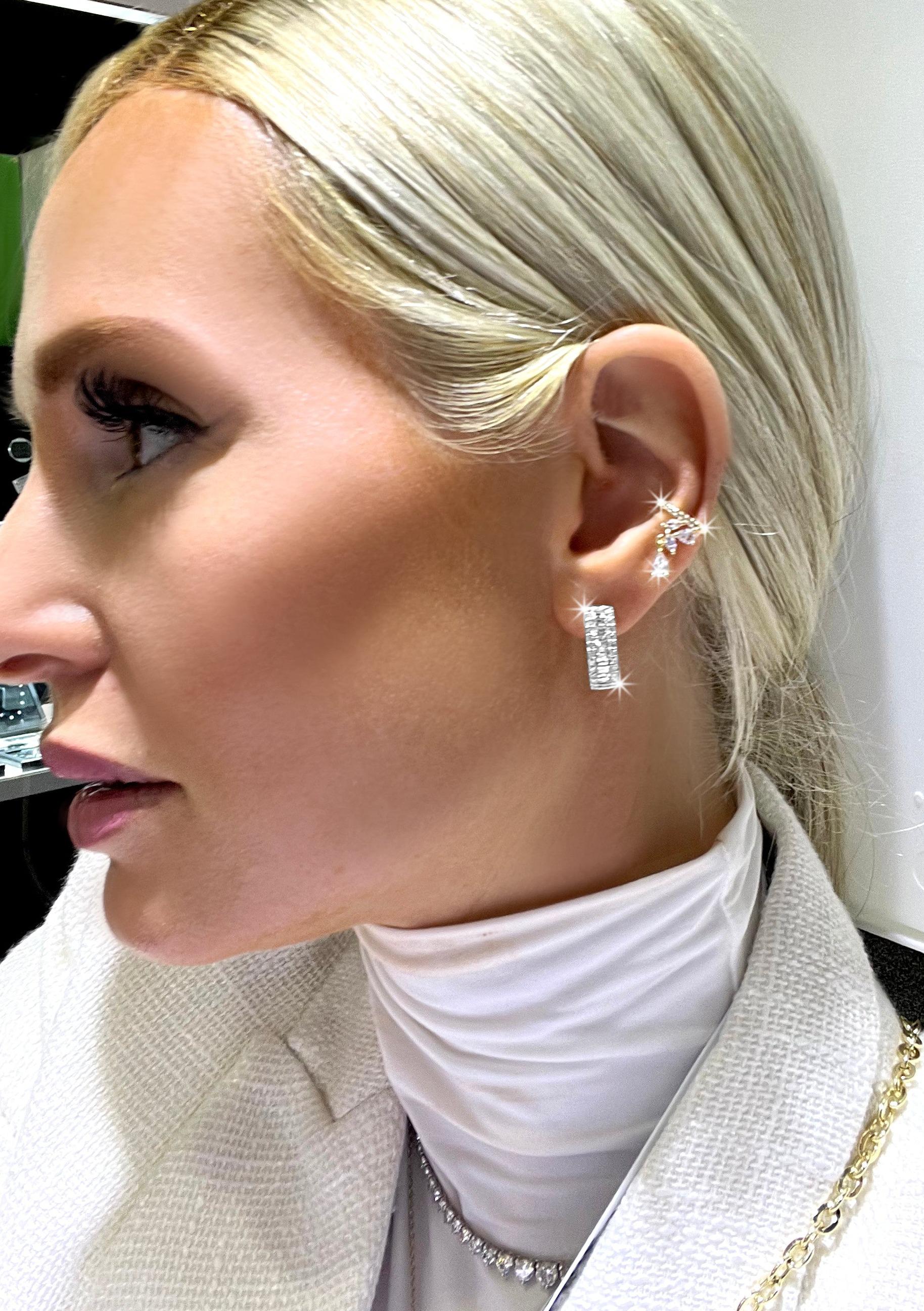 AdornA's Always Hoops make a stunning addition to any outfit. Embellished with grace, these earrings elevate any ensemble to a level of sophistication. Featuring total carats of diamonds. 

Earring Information
Diamond Type : Natural Diamond
Metal :
