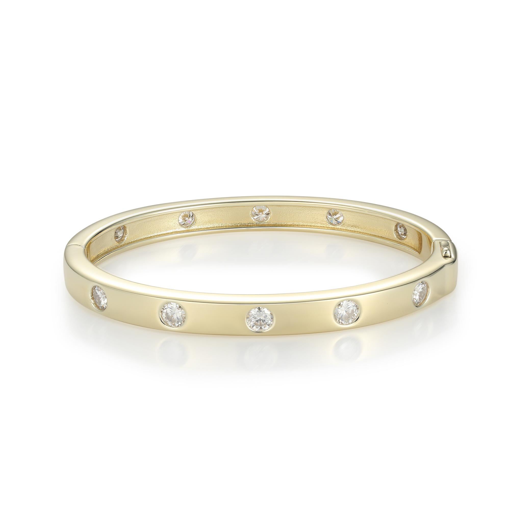 A bezel beauty! Create an enviable stack with this classic golden bangle. This best-selling style boasts a polished gold finished inlaid with 10 sparkling round-cut diamonds. An instant classic that will become your signature.

 
Bracelet