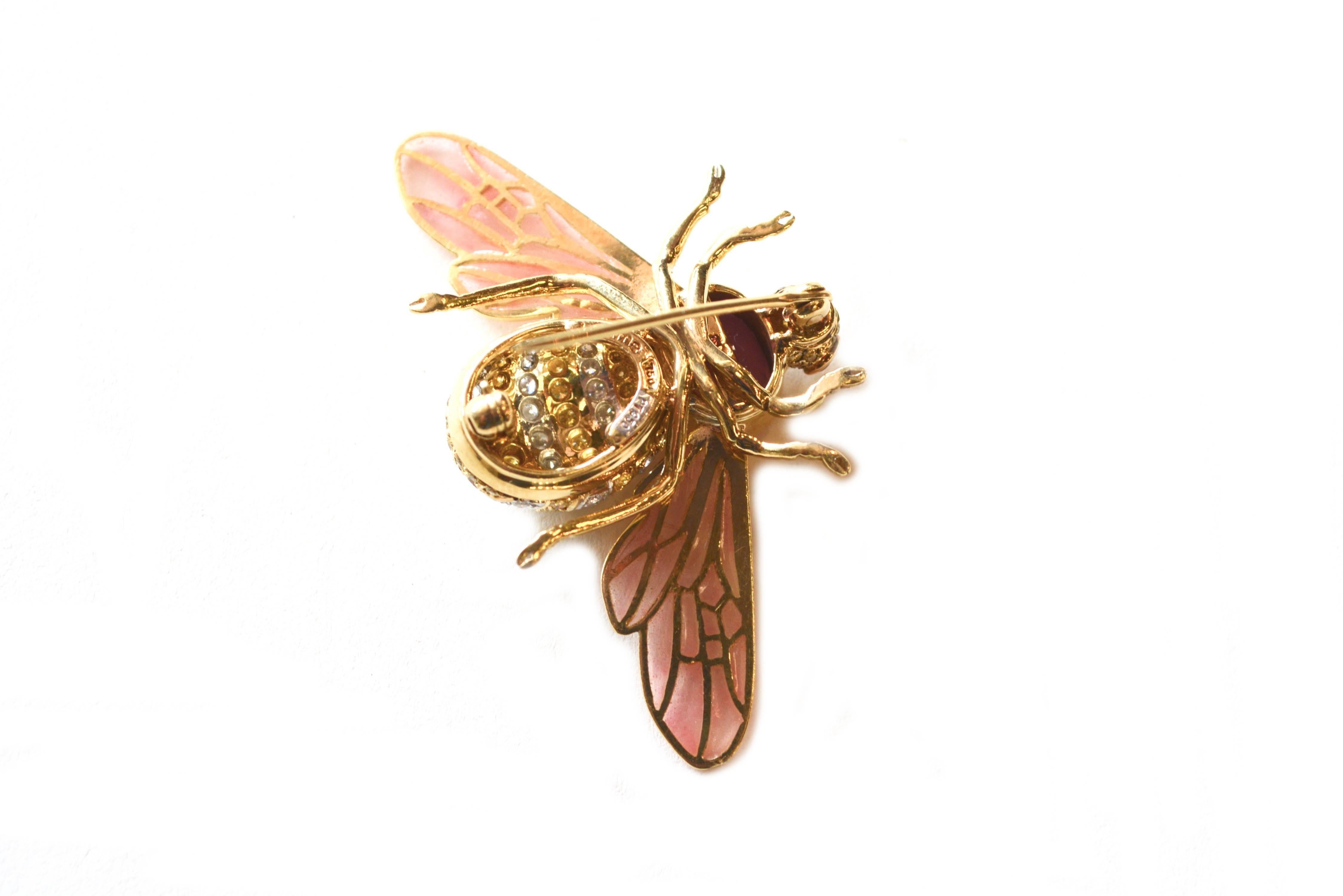 Pink plique-a-jour bee brooch set in 18K gold and platinum rubellite thorax 3.36 ct. Pave white diamonds .7 ct and canary diamond 1.25 ct body. Ruby eyes. About 1.5