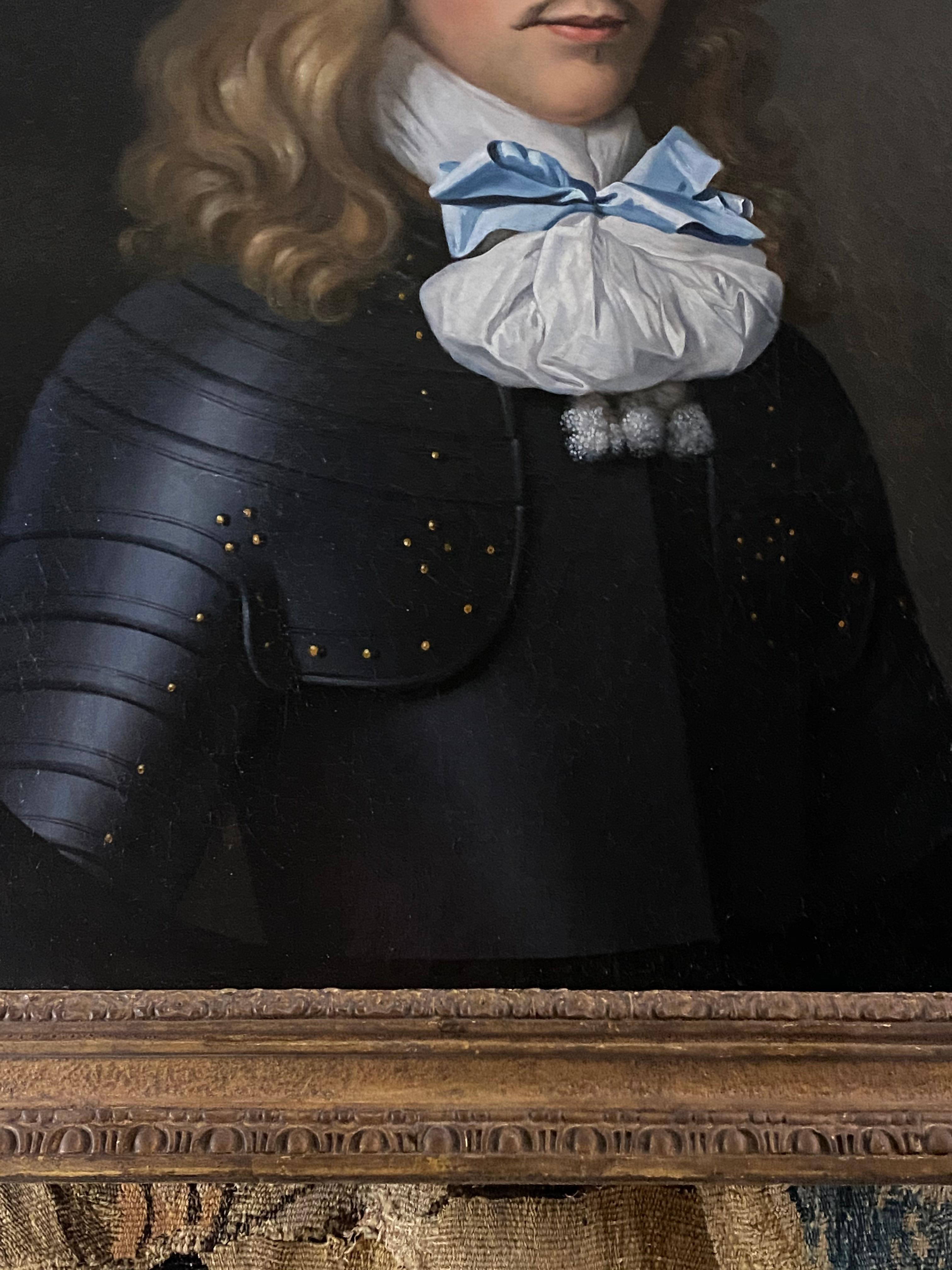 PORTRAIT OF AN OFFICER, c.1660 -  CIRCLE OF ADRIAEN HANNEMAN.
A fine, rare and highly decorative 17th Century portrait of a handsome long haired officer wearing elaborate military dress, by an artist in the circle  of Adriaen Hanneman
