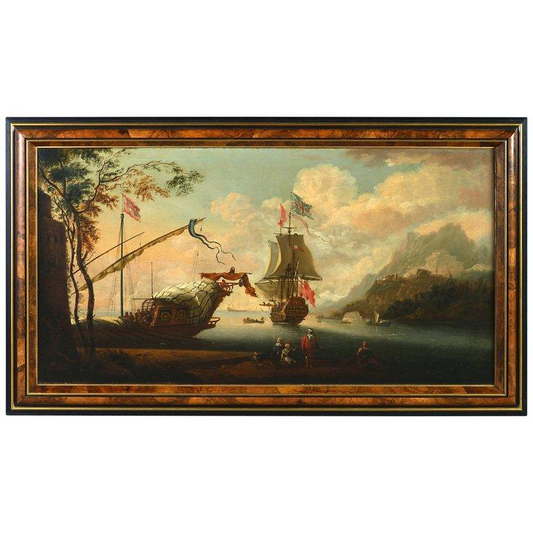 A late seventeenth century capriccio port scene, depicting a British Naval ship and a trade vessel in an imaginary setting. 

Listed Dimensions refer to framed size. 

Adriaen van Diest (1655–1704) was a Dutch painter, who for most of his life