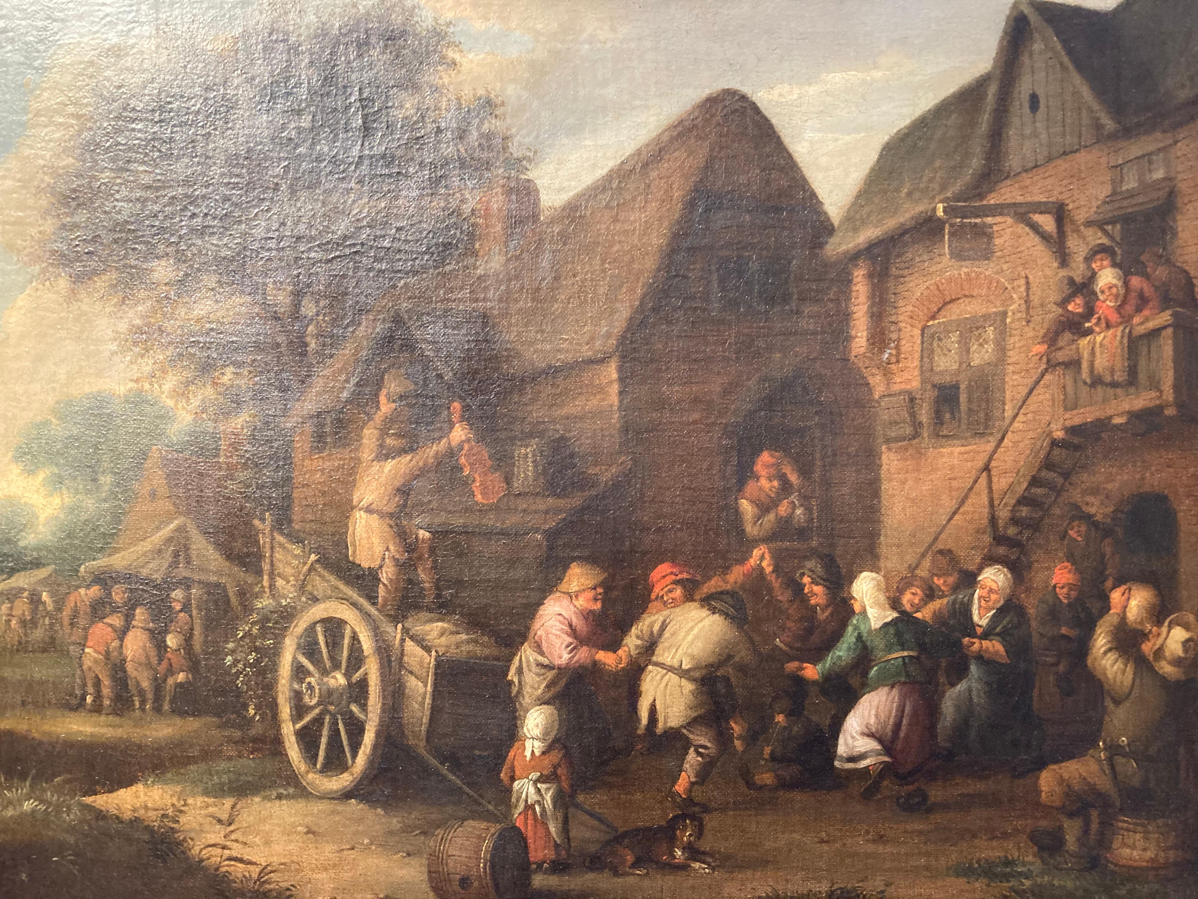Circle of Adriaen or Isaac van Ostade, Peasants dancing and drinking by an Inn 1
