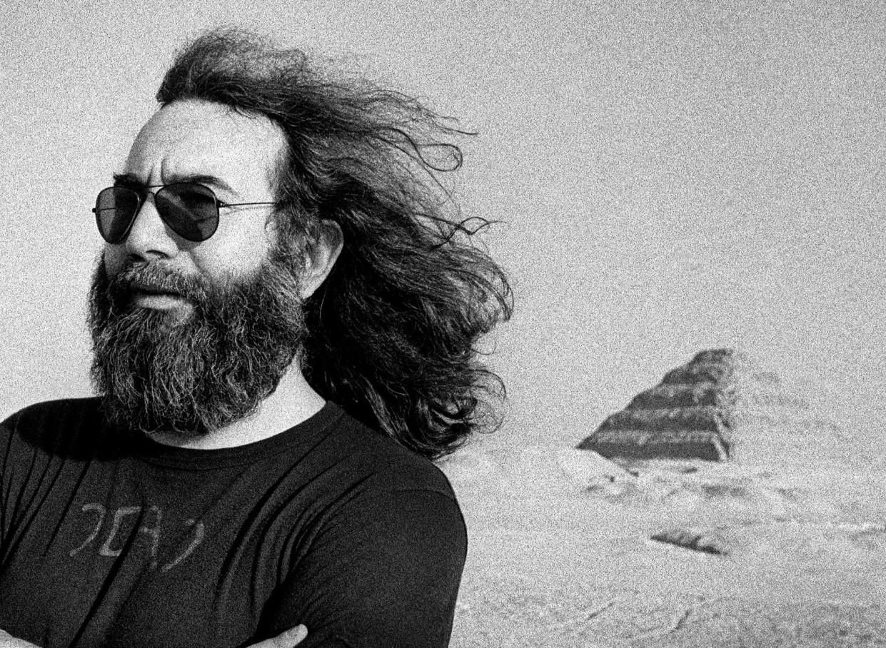 Jerry Garcia at the Pyramids - Photograph by Adrian Boot