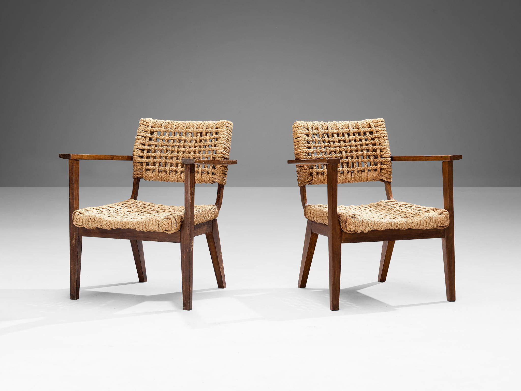 Adrien Audoux & Frida Minet for Vibo, pair of armchairs, stained beech, straw, France, 1950s

Pair of armchairs designed by the duo Adrien Audoux and Frida Minet. The seating and backrest are made of woven hemp from the abaca plant which is close